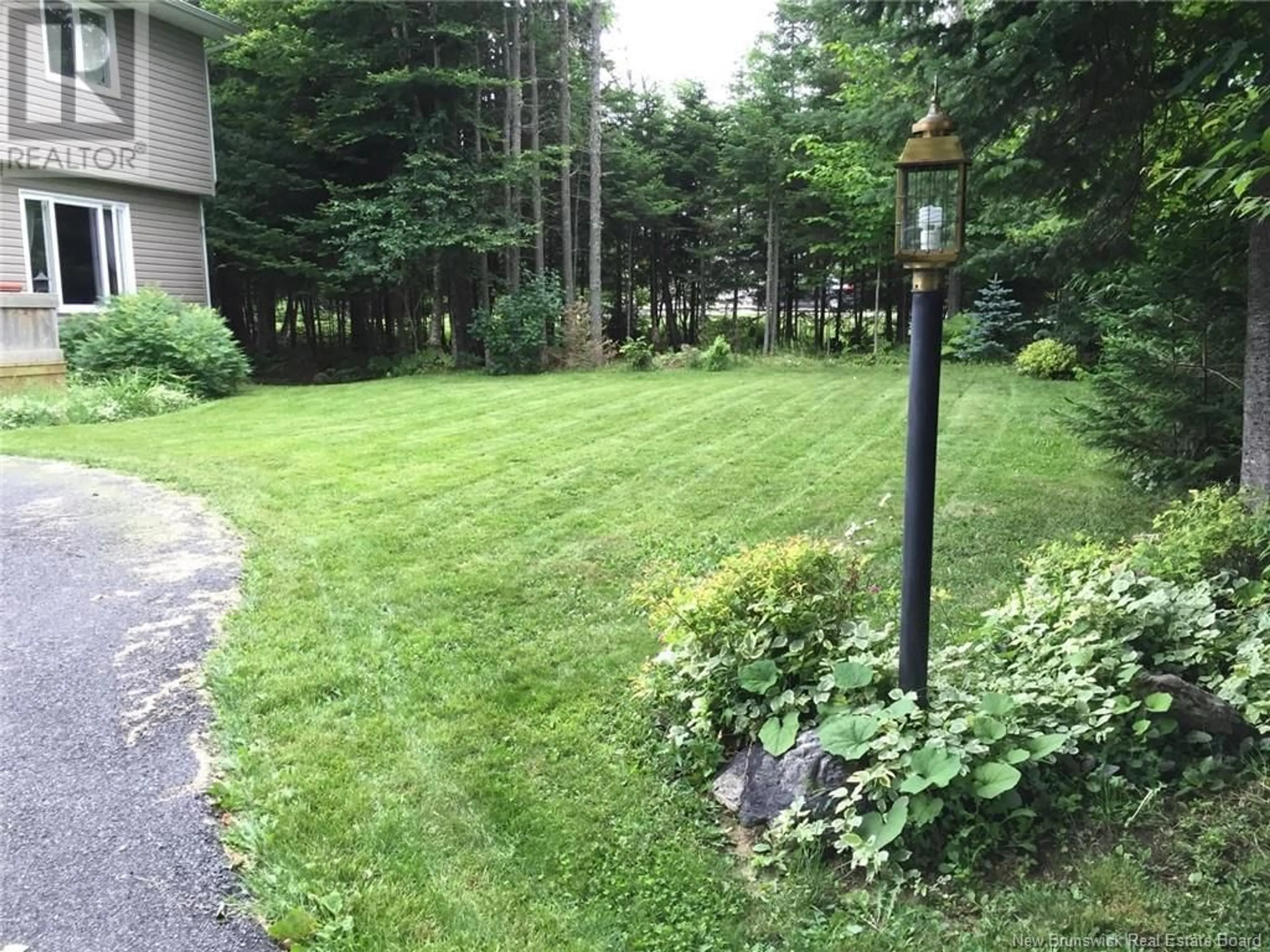 Patio, forest/trees view for 14 Cliff Street, Quispamsis New Brunswick E2G1Y4