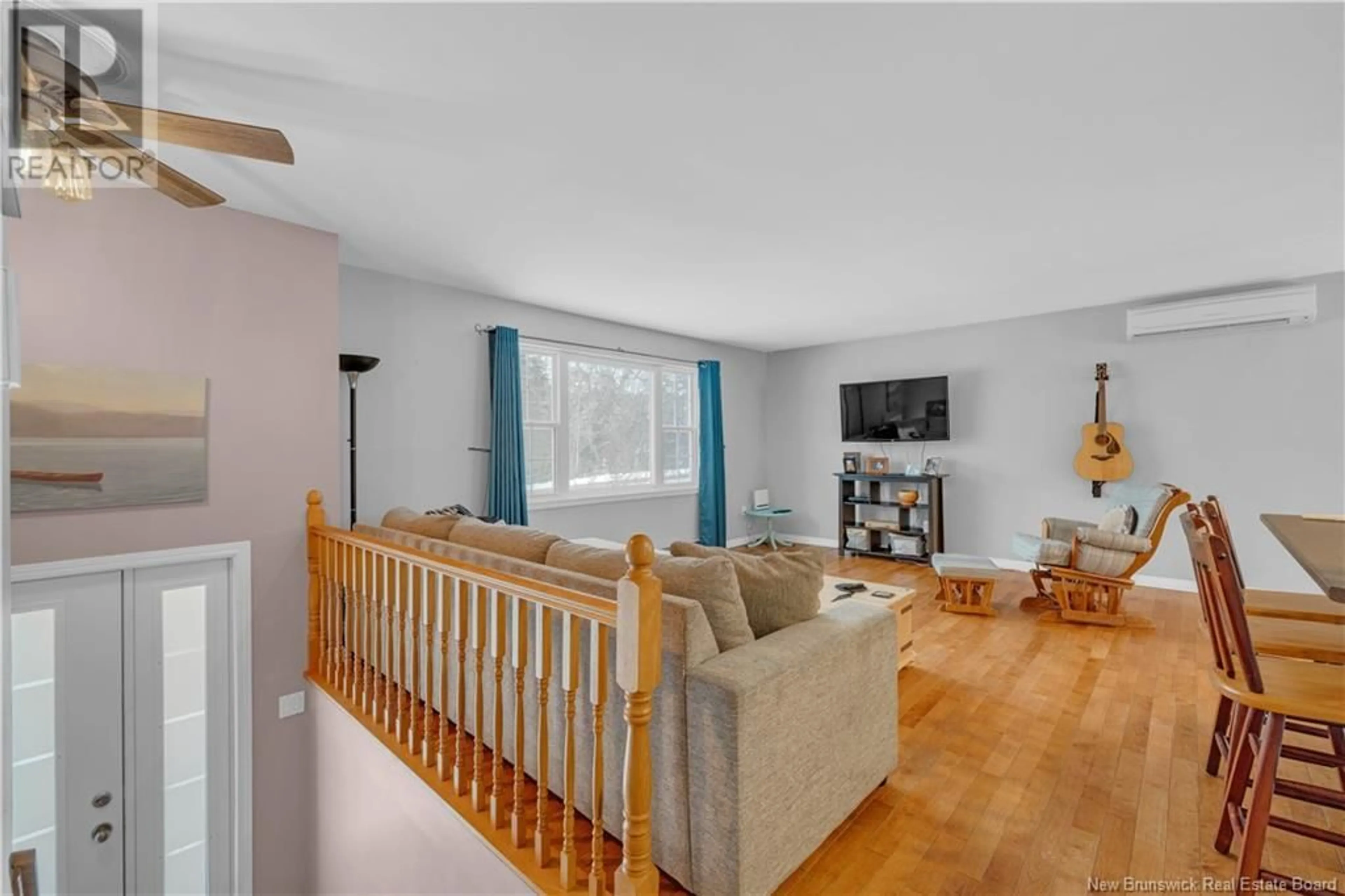 Living room with furniture, wood/laminate floor for 60 Bartlett Avenue, Hampton New Brunswick E5N5J1