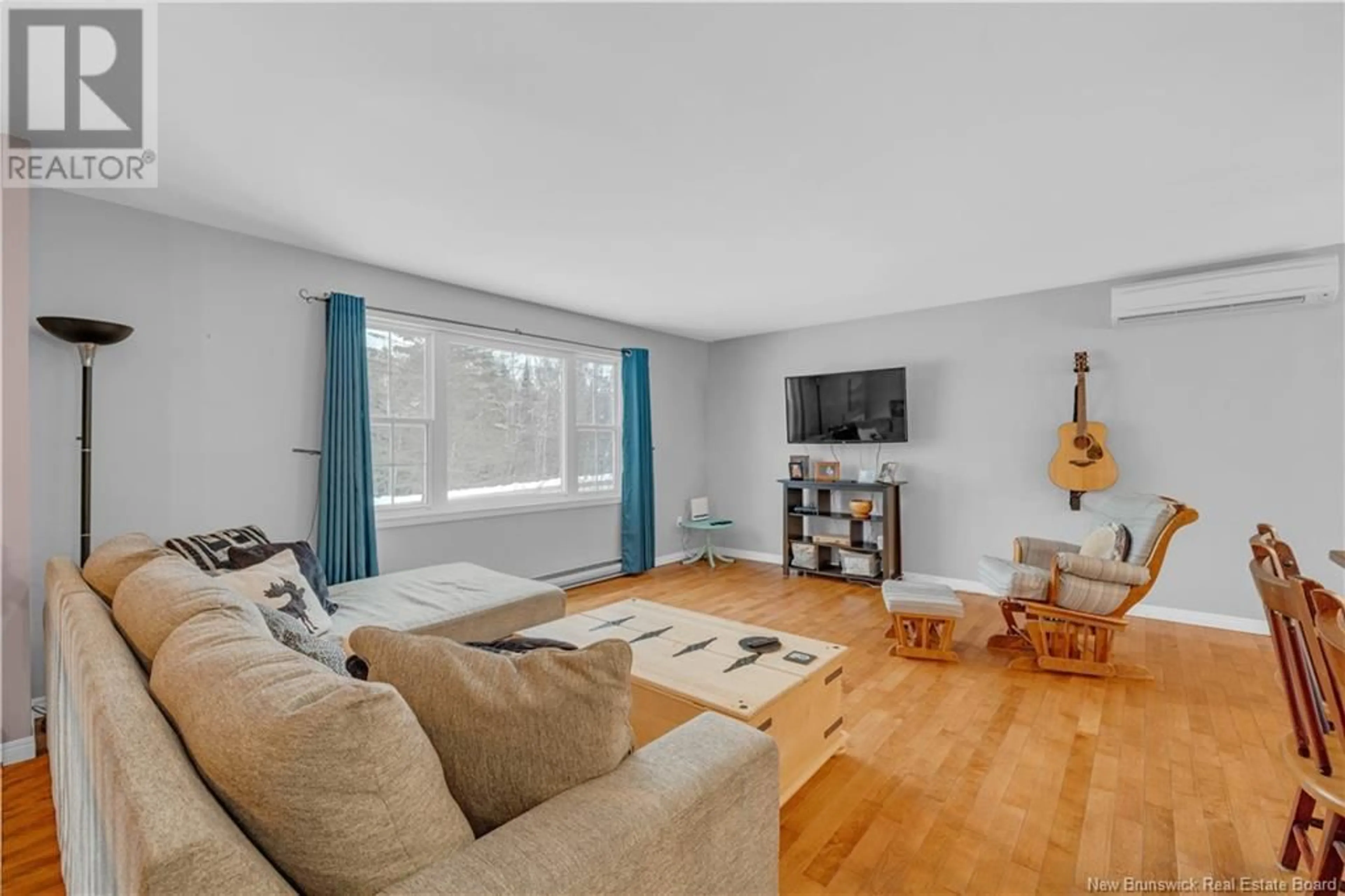 Living room with furniture, unknown for 60 Bartlett Avenue, Hampton New Brunswick E5N5J1