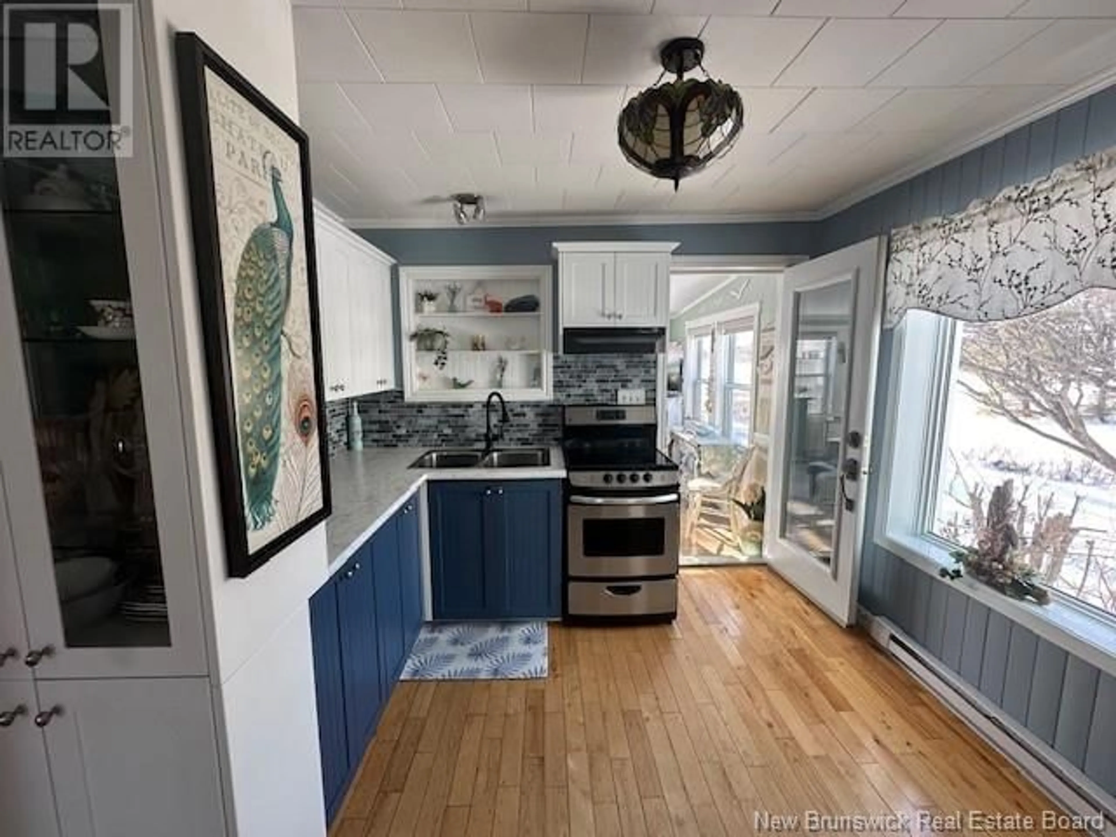 Open concept kitchen, unknown for 42 Rue de L'Anse Street, Eel River Crossing New Brunswick E8E1R4