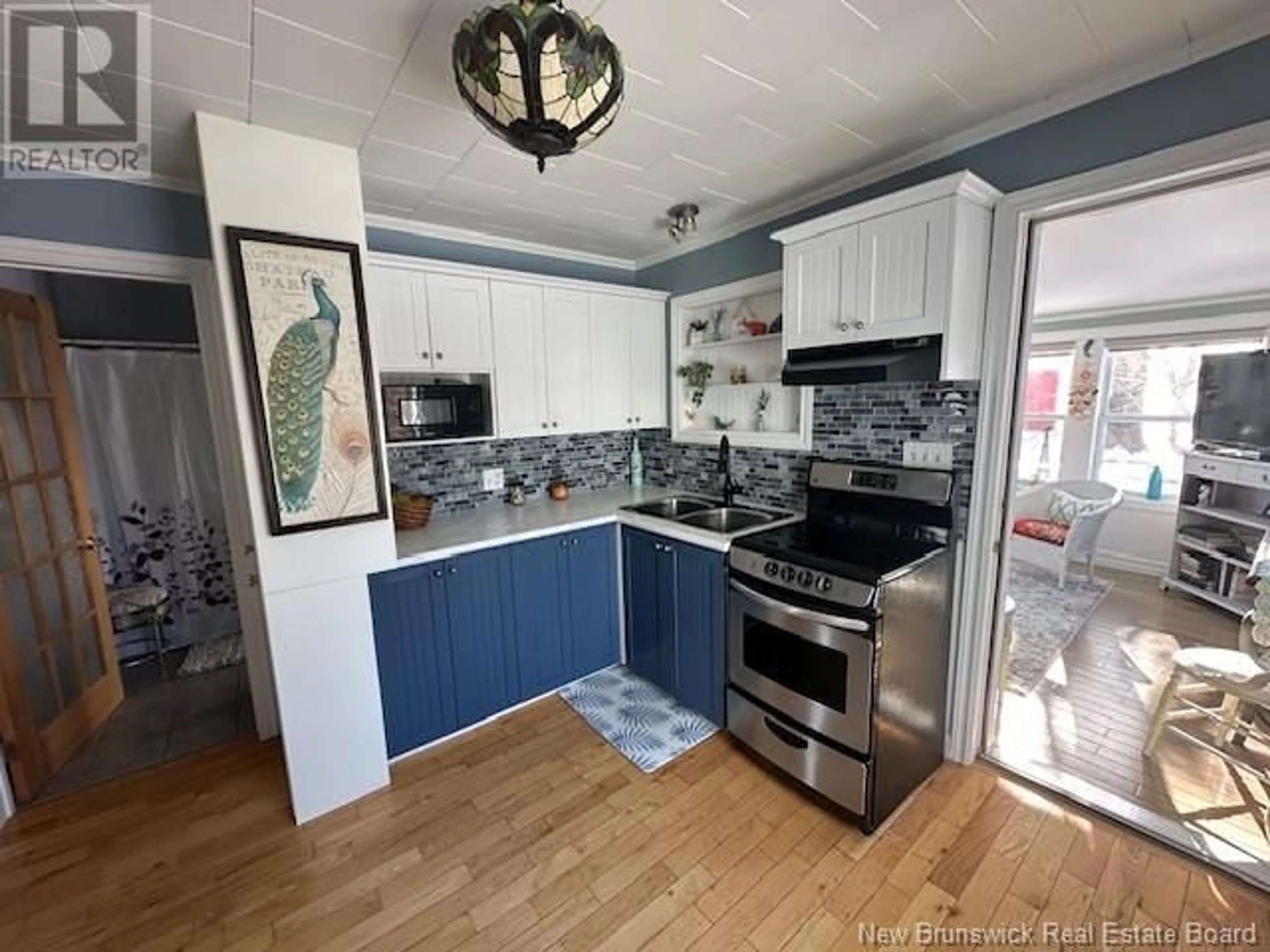 Open concept kitchen, unknown for 42 Rue de L'Anse Street, Eel River Crossing New Brunswick E8E1R4