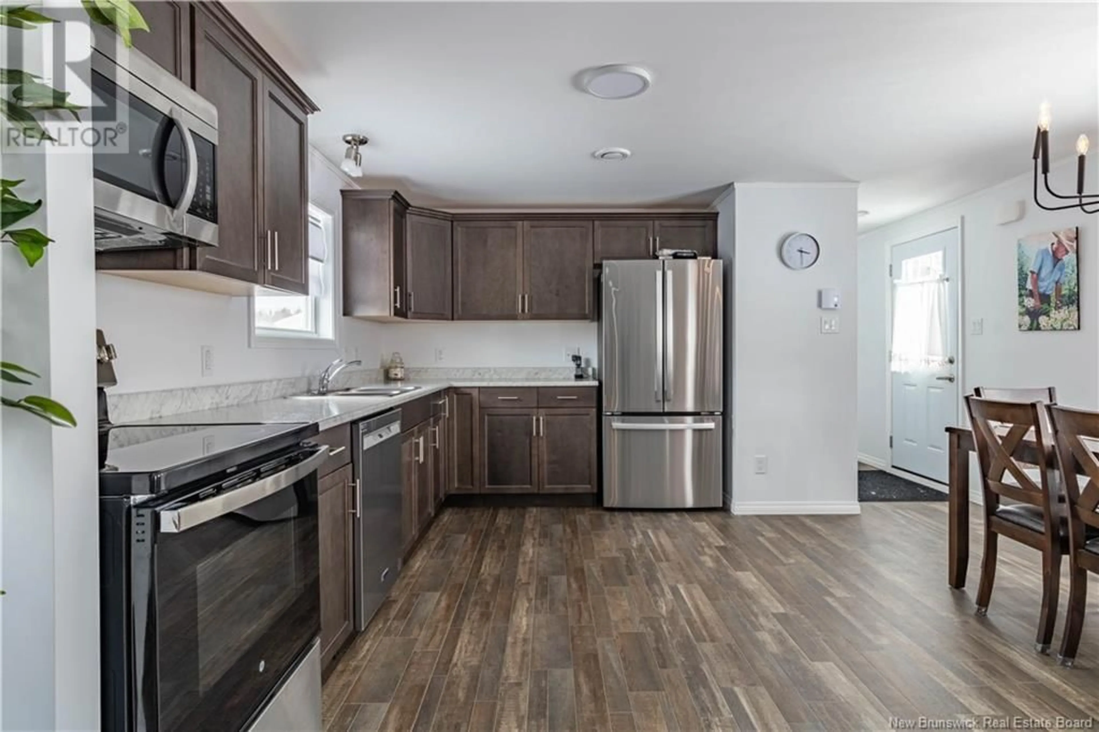 Open concept kitchen, unknown for 36 Orchard Crescent, Picadilly New Brunswick E4E3X6