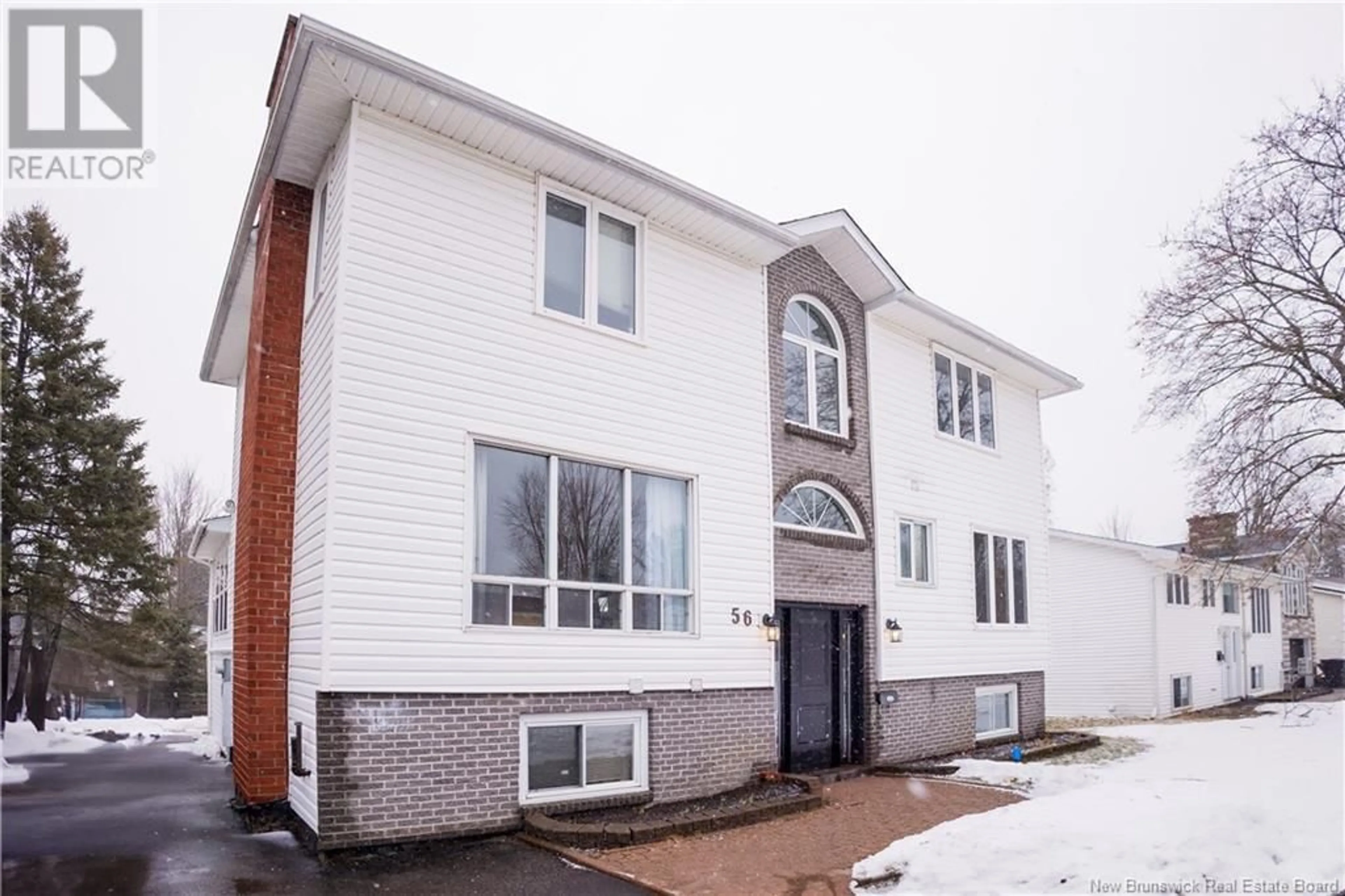 Home with brick exterior material, building for 56 Meadow Green Court, Fredericton New Brunswick E3B5L8