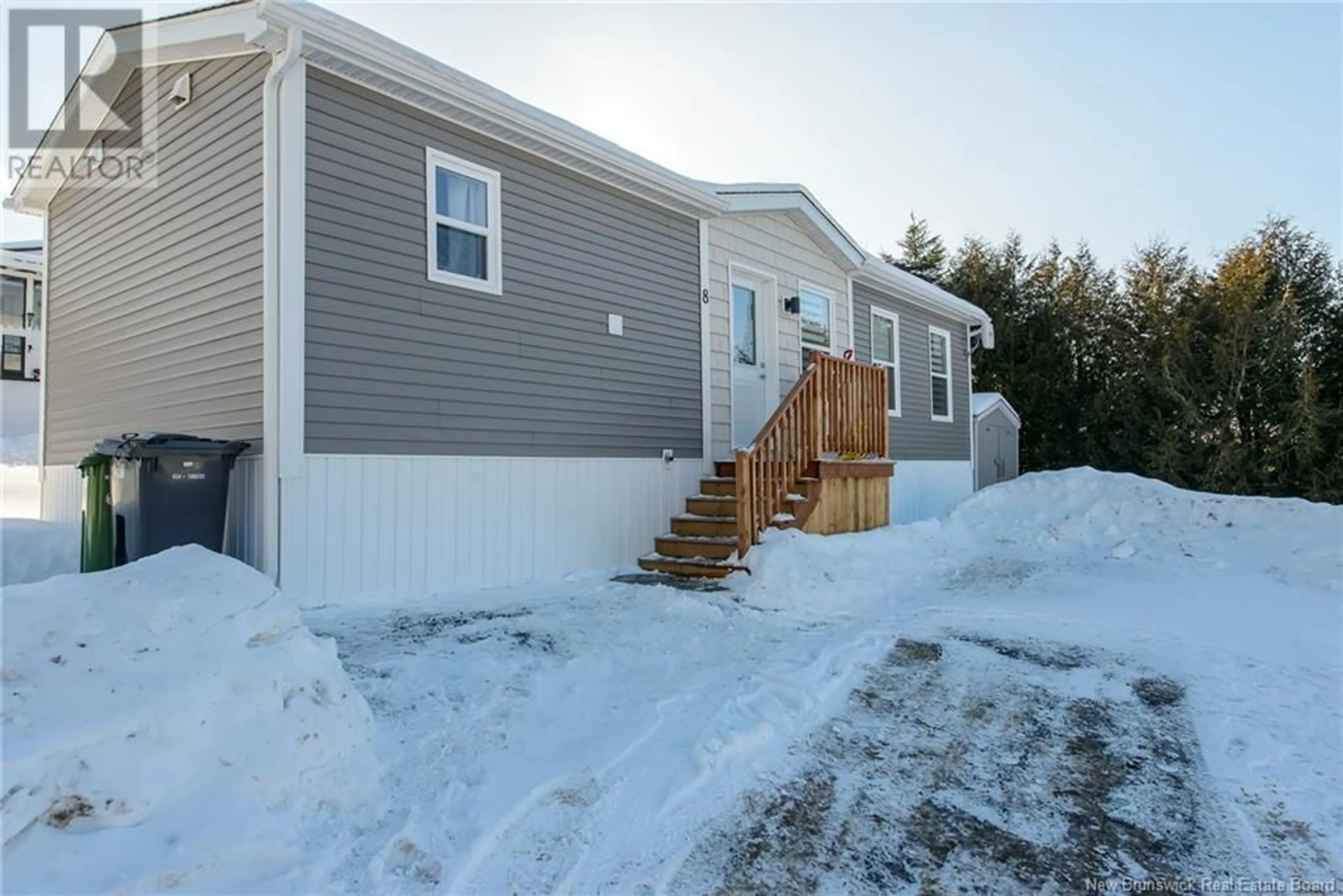 Home with vinyl exterior material, street for 8 Sixth Street, Quispamsis New Brunswick E2G1W3