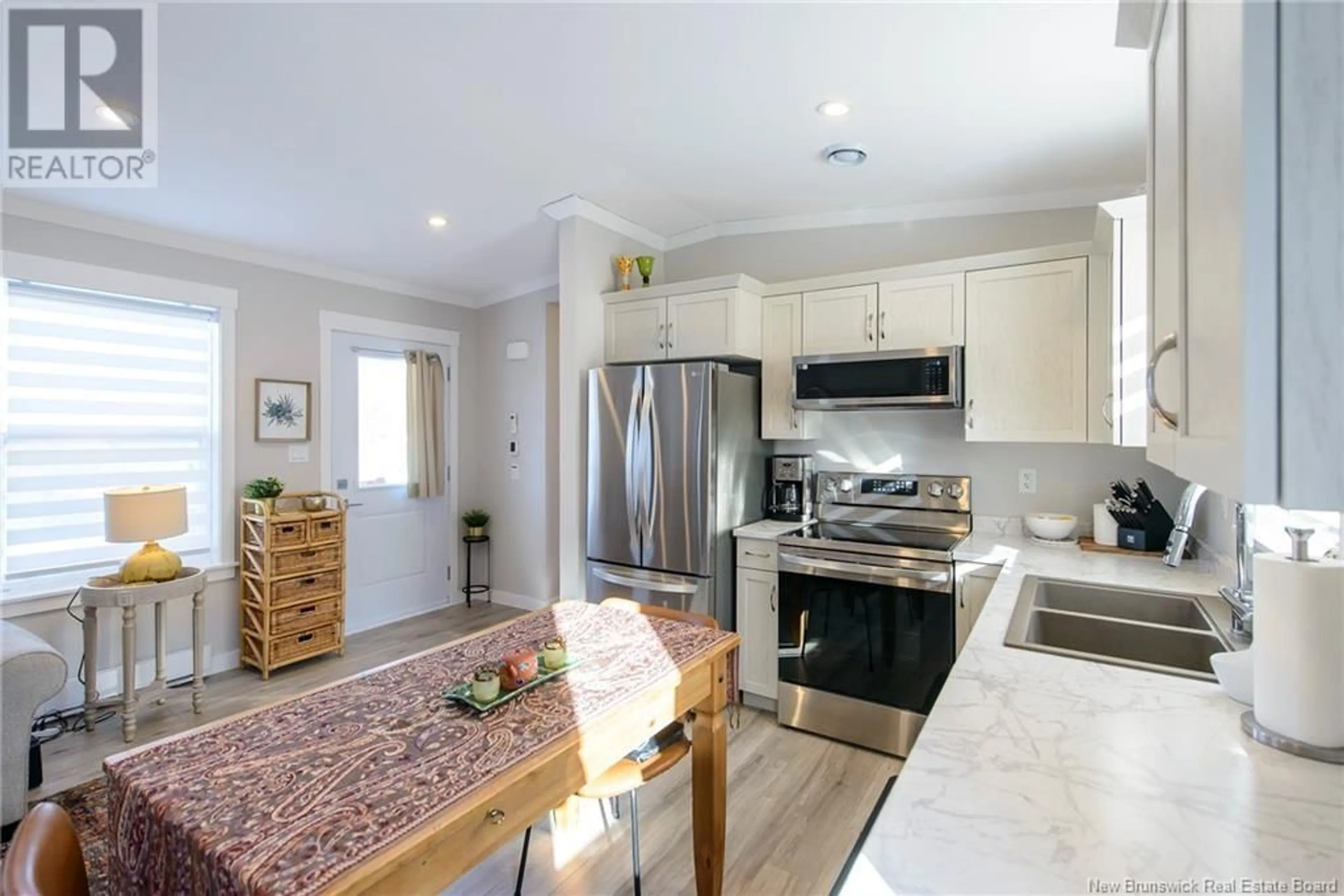 Open concept kitchen, unknown for 8 Sixth Street, Quispamsis New Brunswick E2G1W3