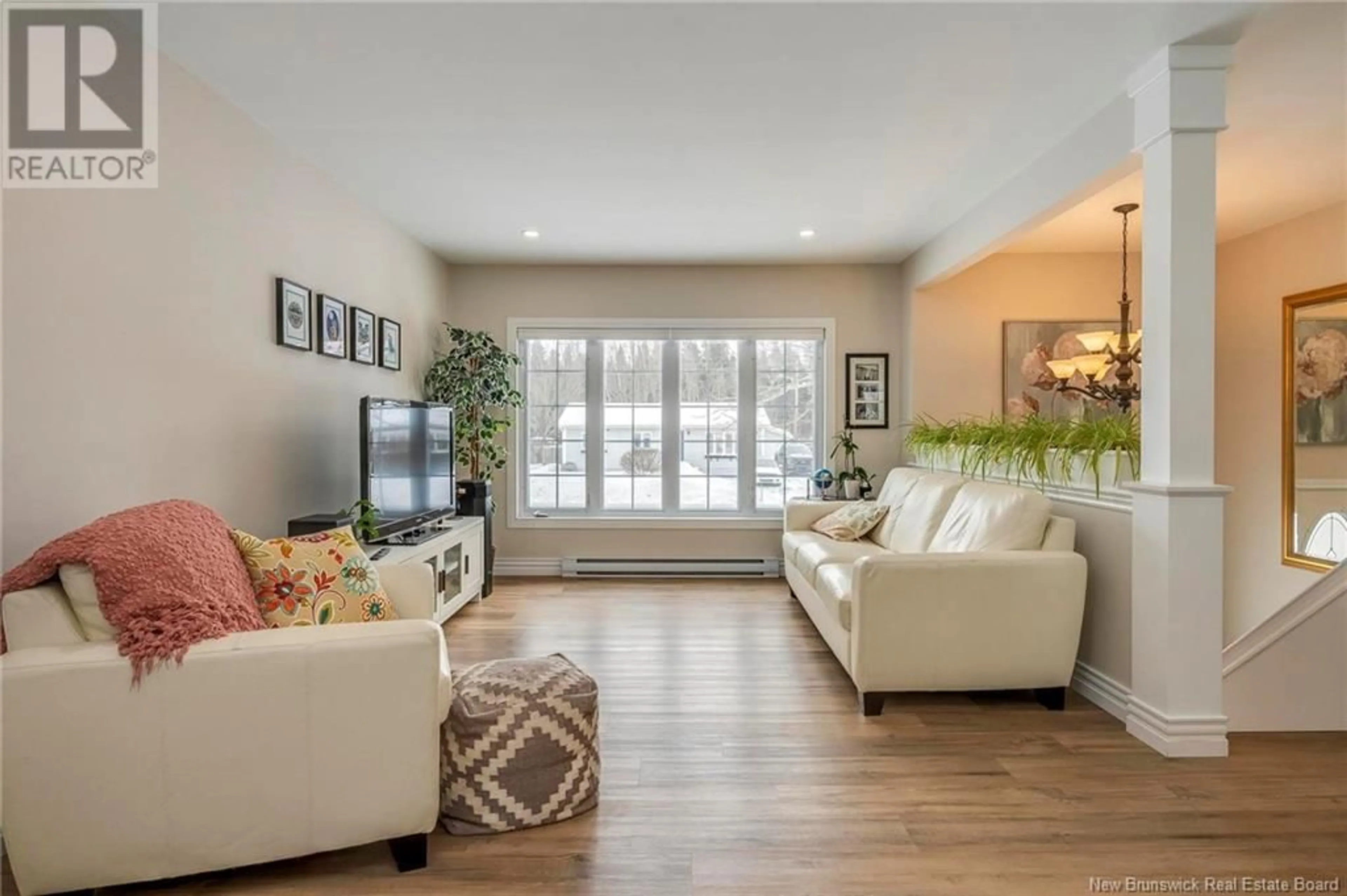 Living room with furniture, wood/laminate floor for 106 Lawson Avenue, Riverview New Brunswick E1B4B9