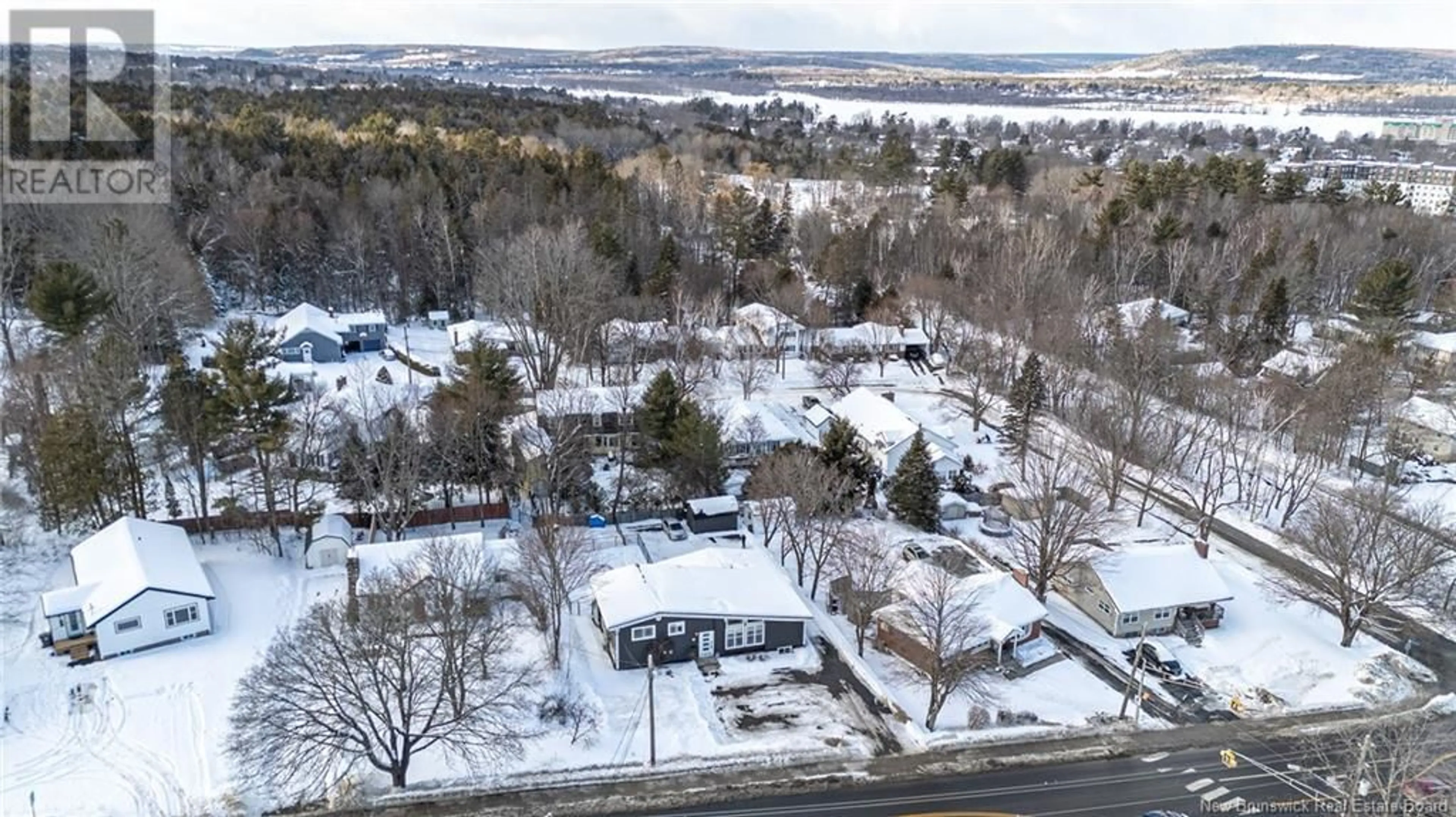 A pic from outside/outdoor area/front of a property/back of a property/a pic from drone, mountain view for 675 Smythe Street, Fredericton New Brunswick E3B3G2