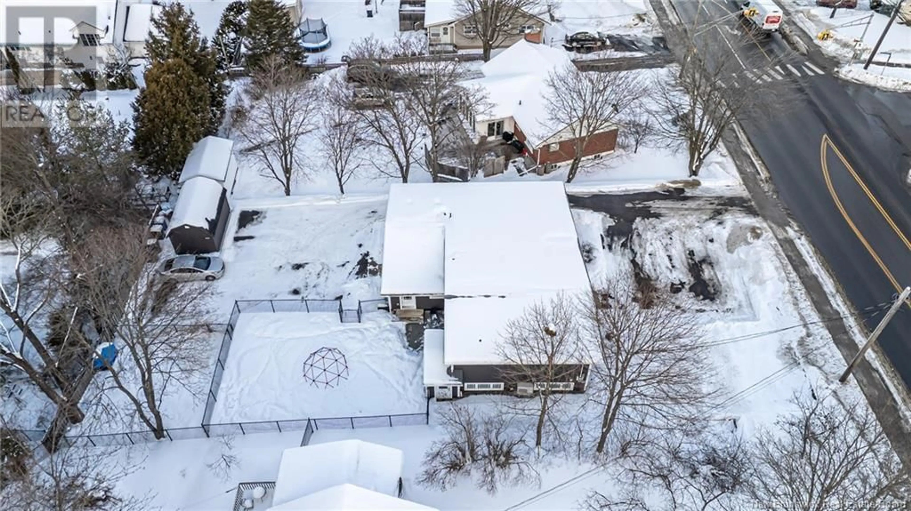 A pic from outside/outdoor area/front of a property/back of a property/a pic from drone, street for 675 Smythe Street, Fredericton New Brunswick E3B3G2