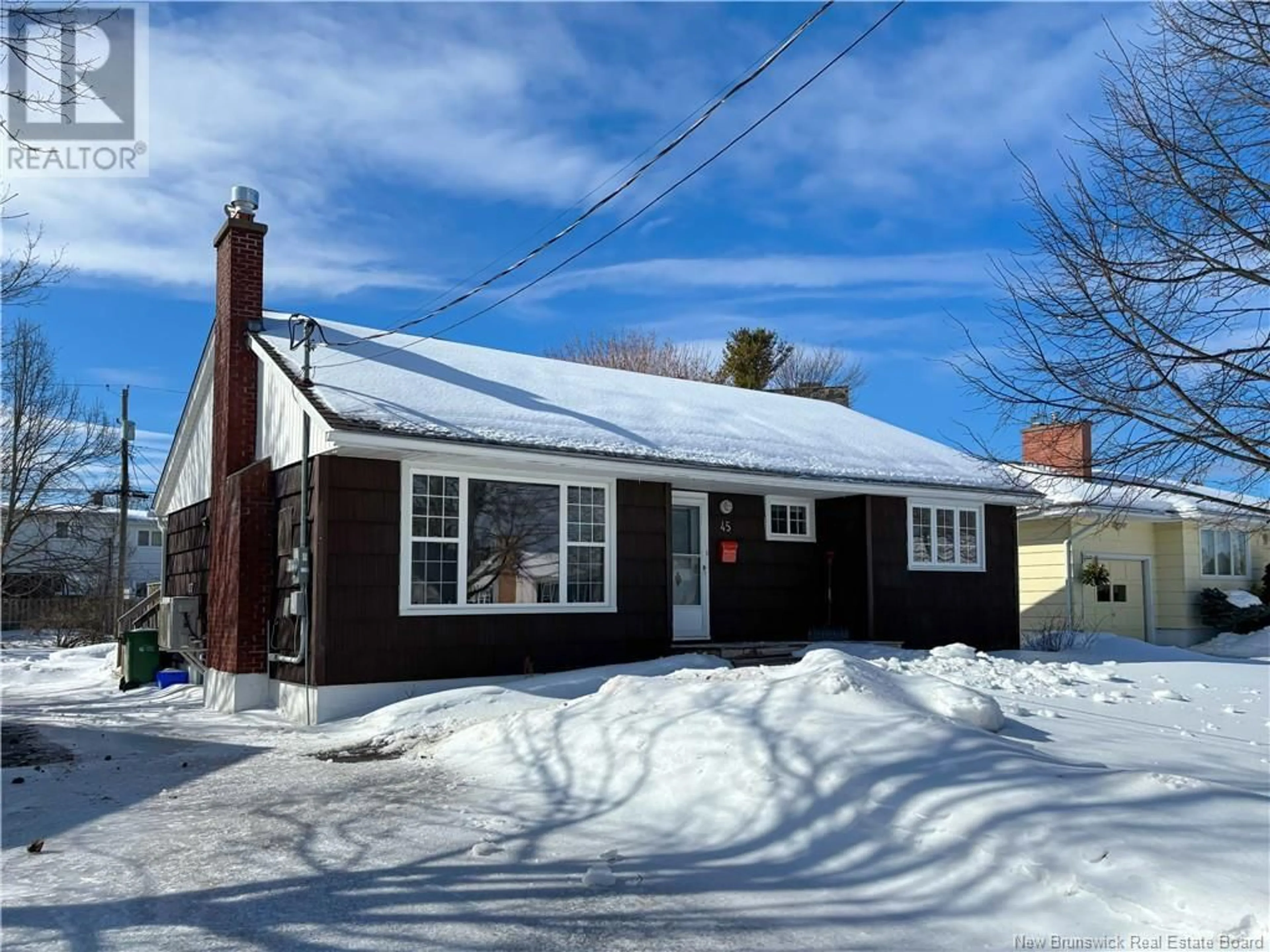 Home with vinyl exterior material, street for 45 Ray Street, Saint John New Brunswick E2K2K3