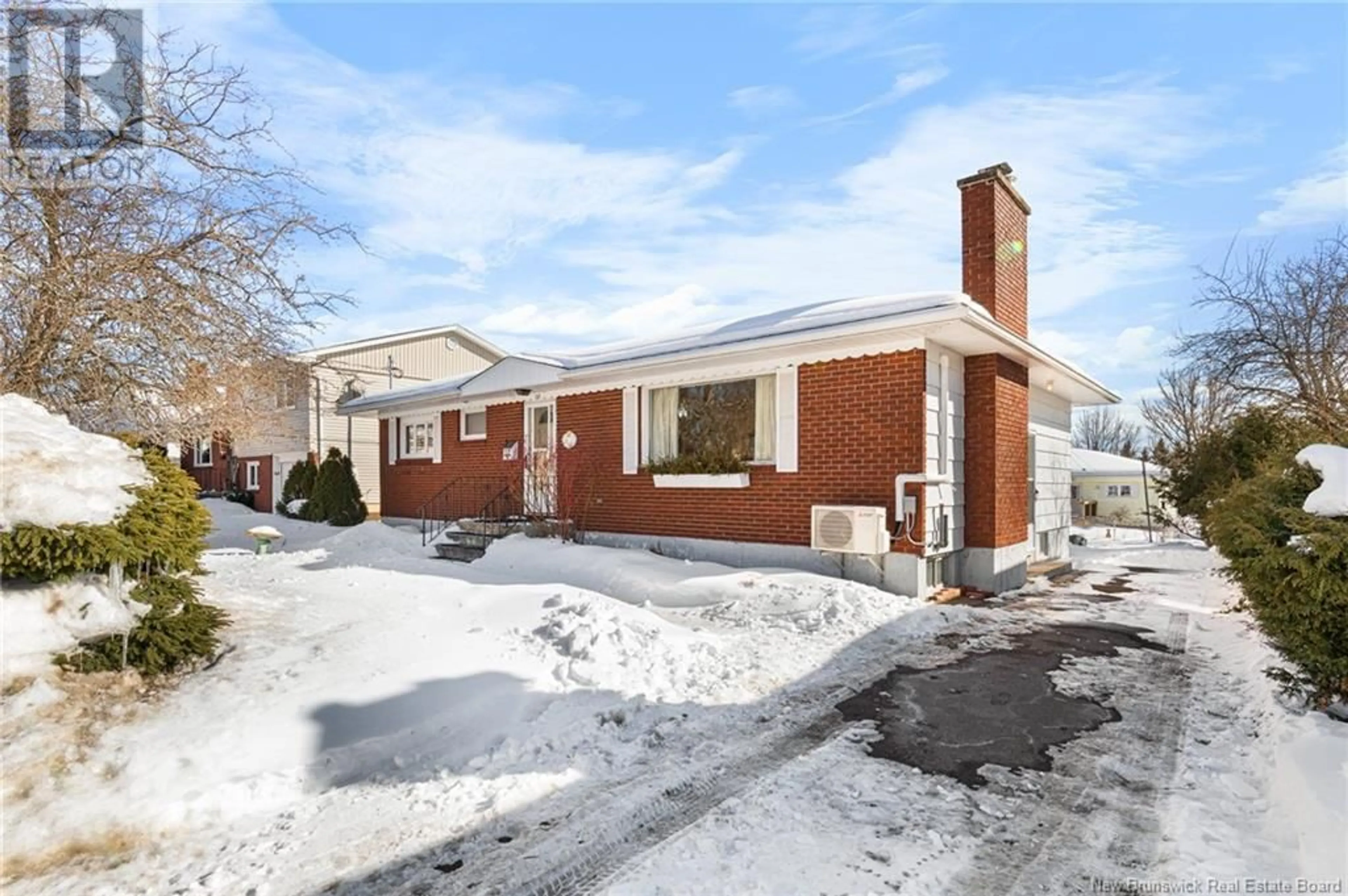 Home with brick exterior material, street for 38 Rosewood Crescent, Moncton New Brunswick E1E1M6