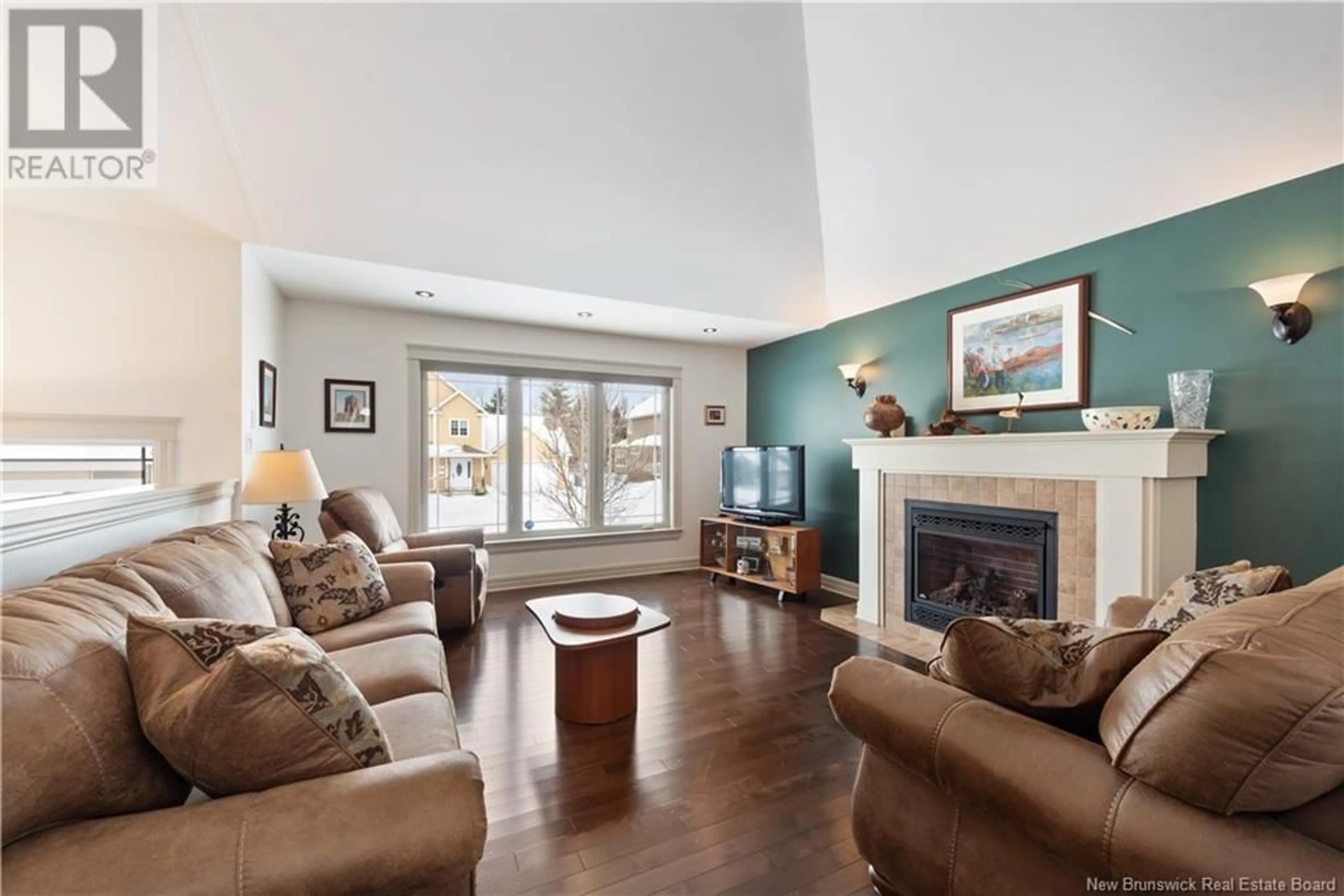 Living room with furniture, wood/laminate floor for 29 Bliss Noiles Street, Dieppe New Brunswick E1A0W7