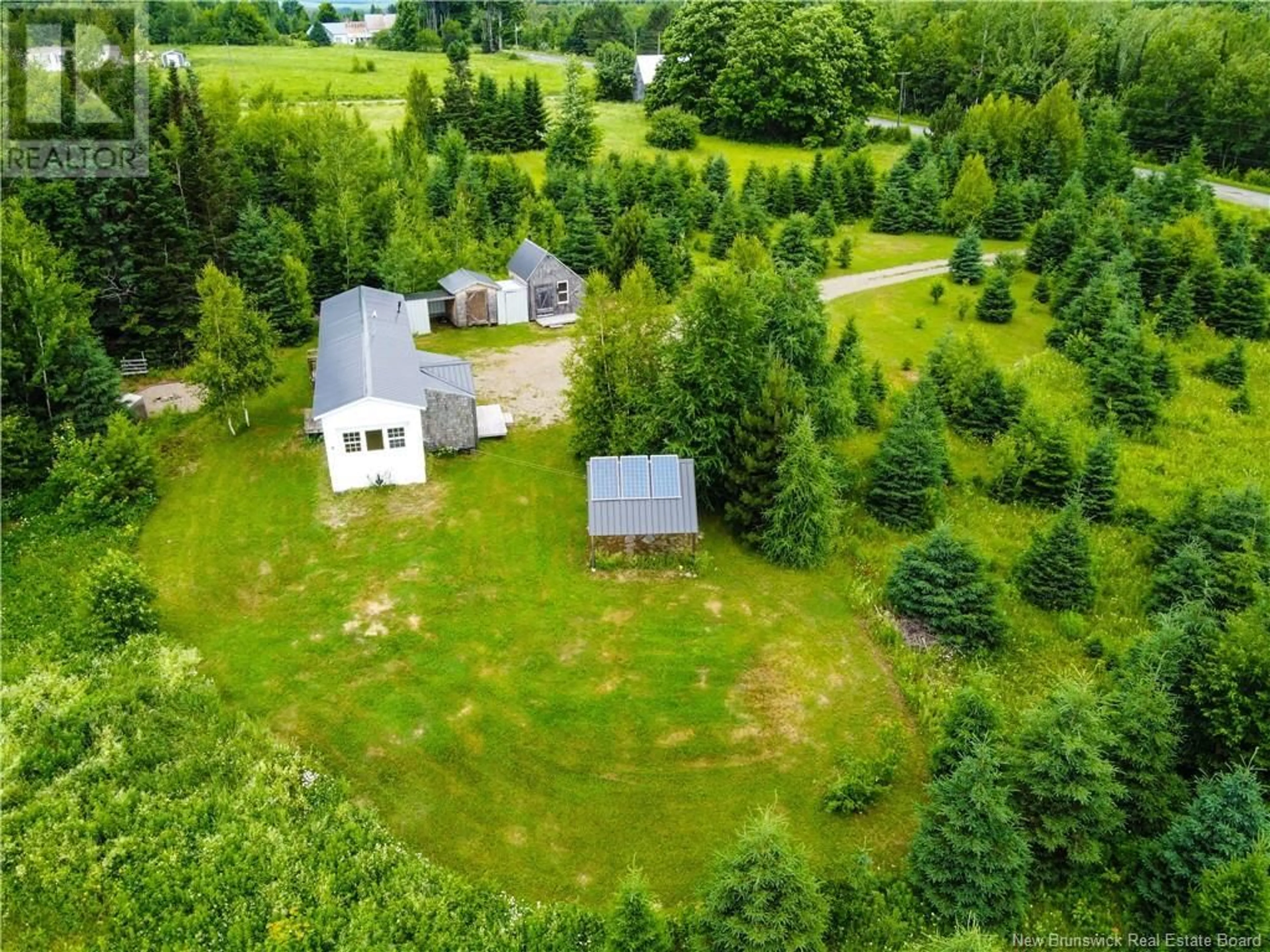 A pic from outside/outdoor area/front of a property/back of a property/a pic from drone, forest/trees view for 563 Watson Settlement Road, Belleville New Brunswick E7M5W3