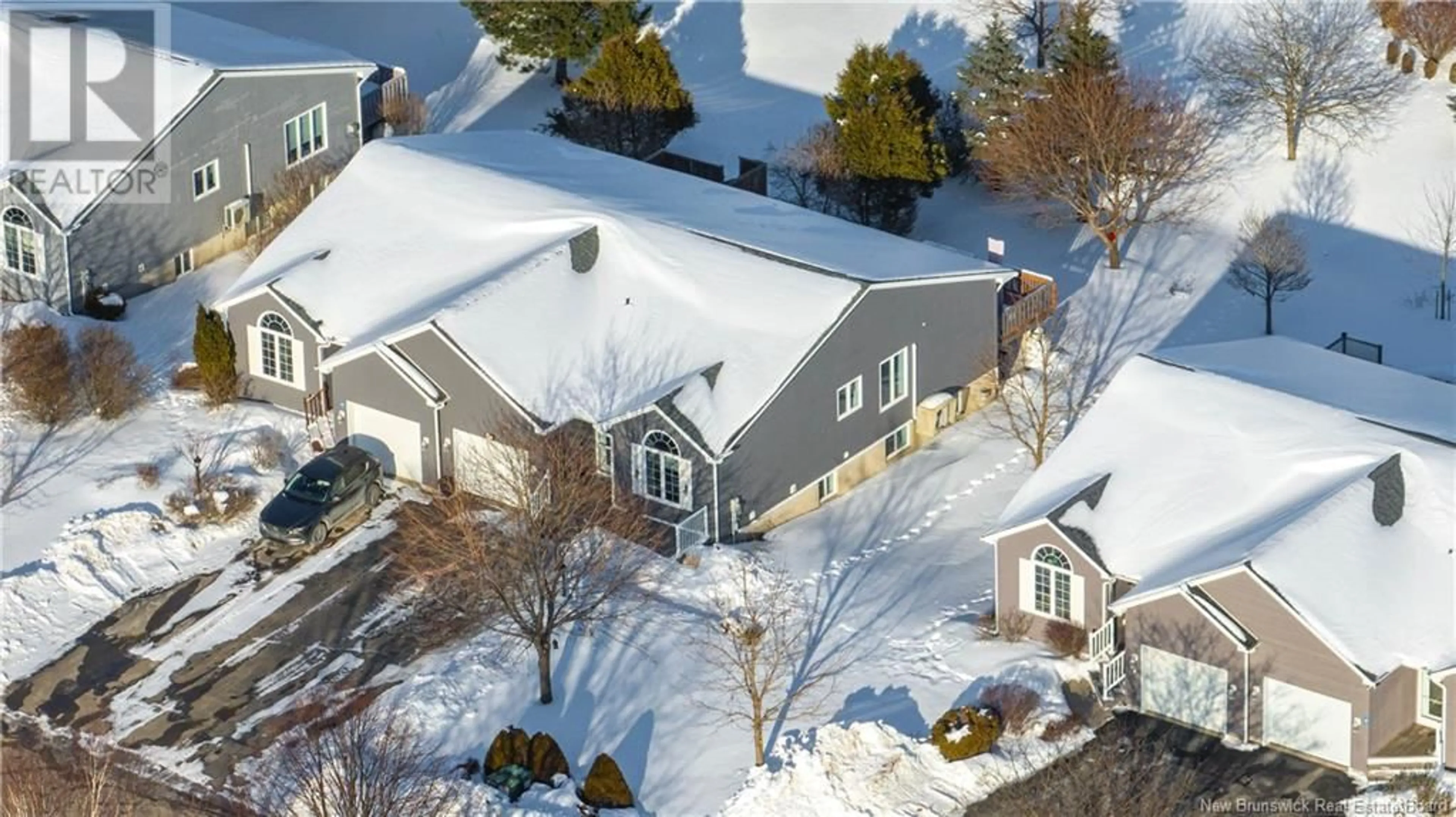 A pic from outside/outdoor area/front of a property/back of a property/a pic from drone, street for 10 Mapledawn Court, Rothesay New Brunswick E1E5Y6