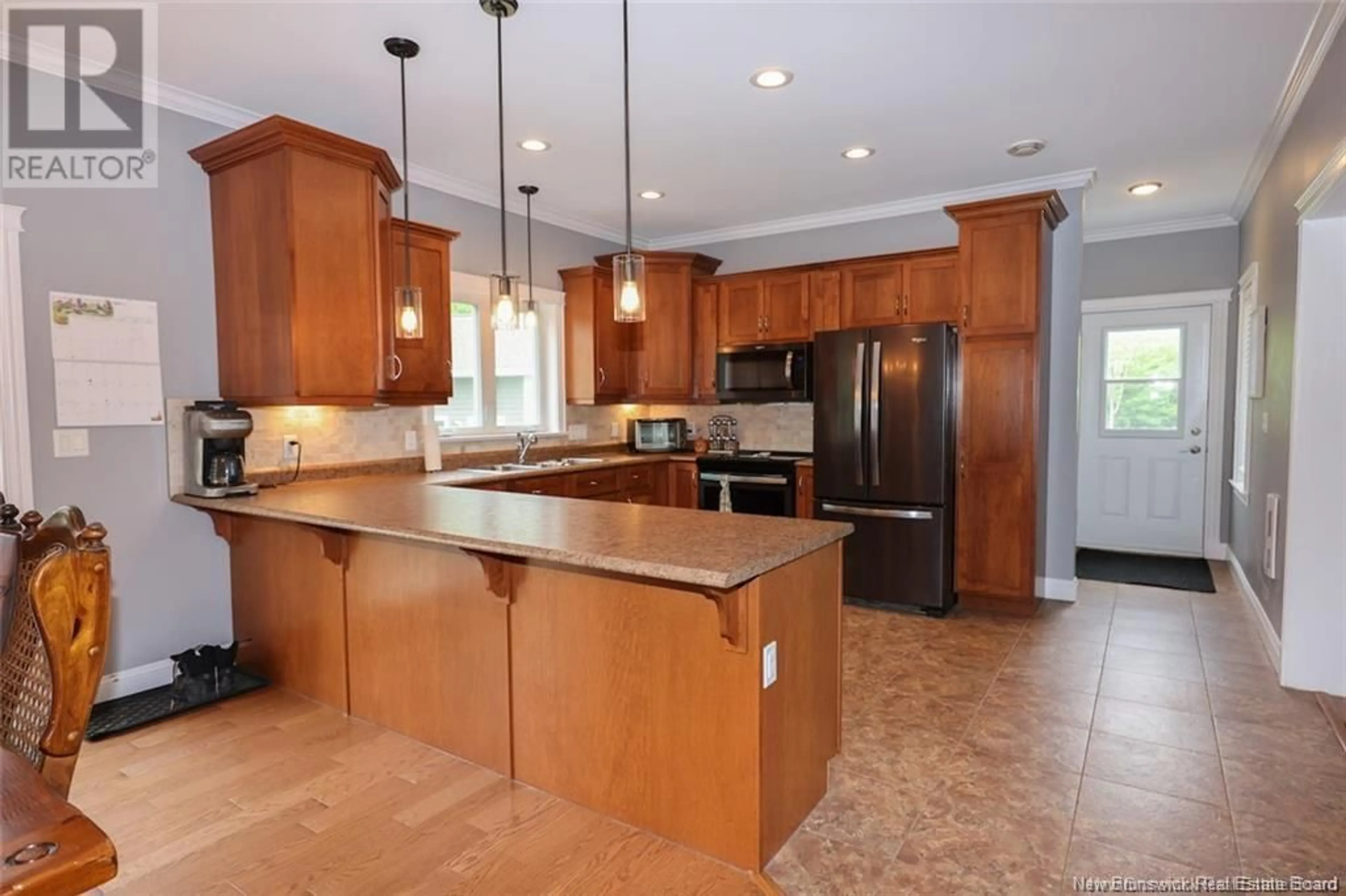 Open concept kitchen, ceramic/tile floor for 28 Shade Tree Lane, Burton New Brunswick E2V0M3