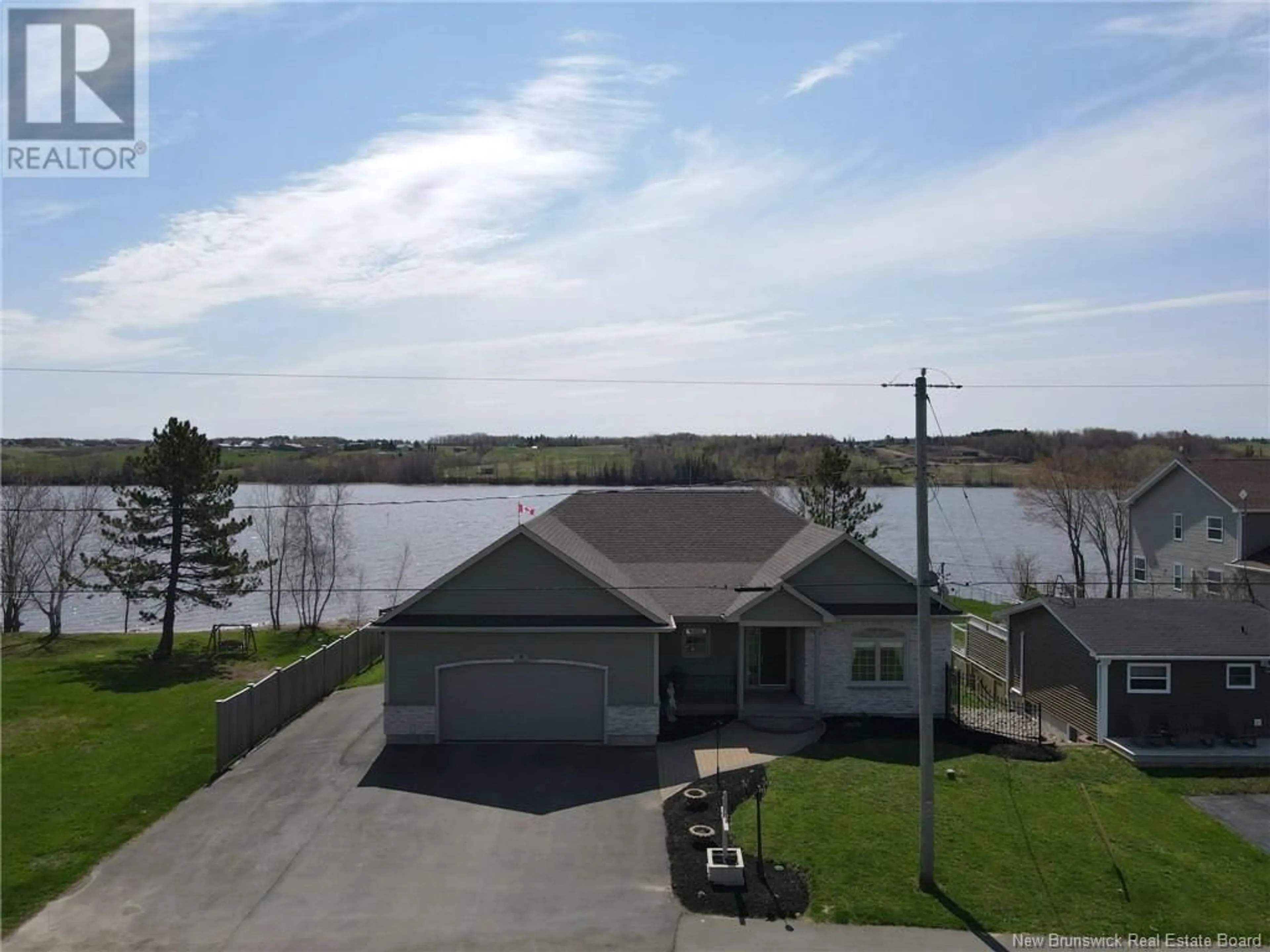 A pic from outside/outdoor area/front of a property/back of a property/a pic from drone, water/lake/river/ocean view for 4 Hilaire Street, Sainte-Marie-De-Kent New Brunswick E4S1V9