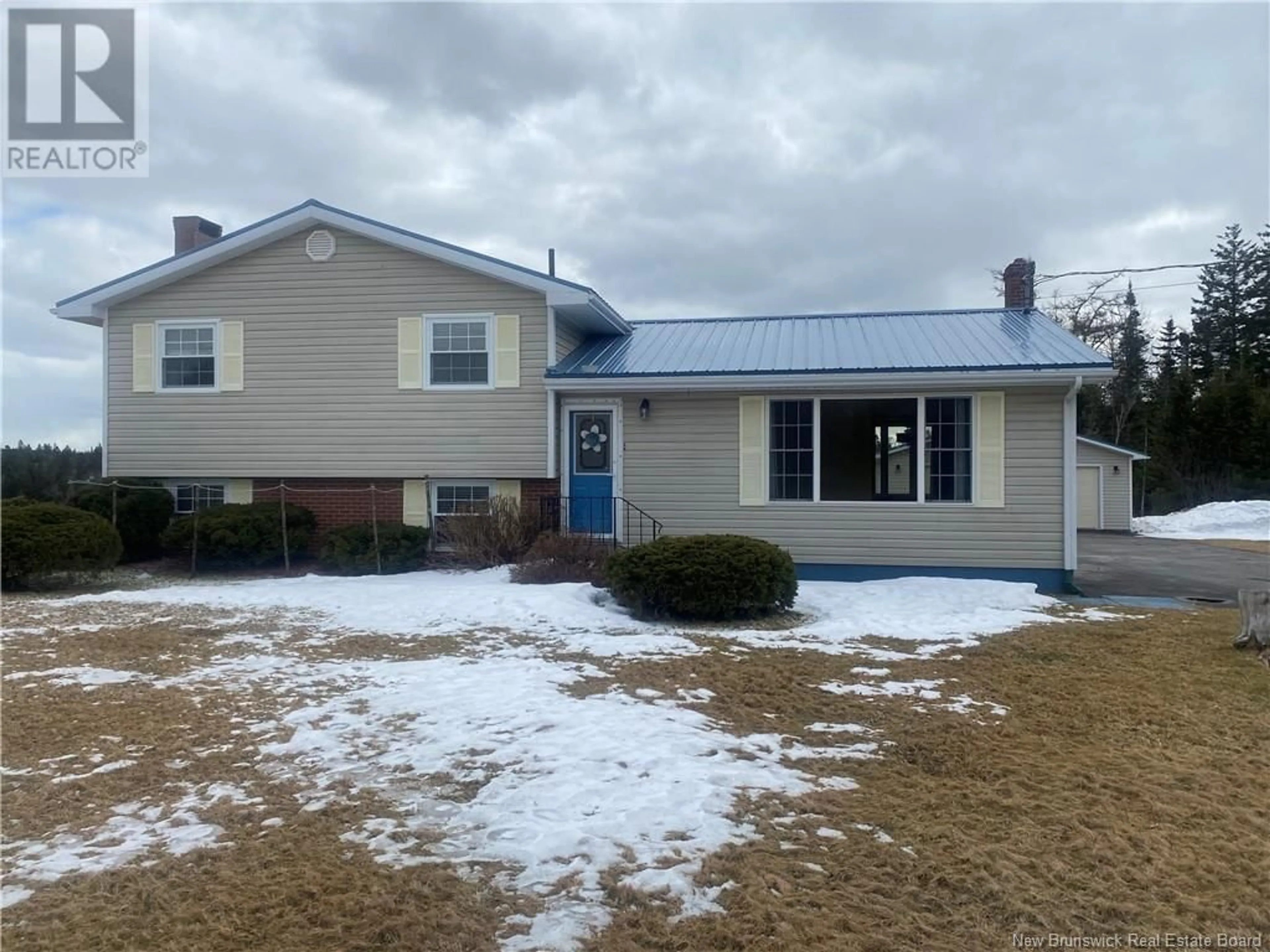 Home with vinyl exterior material, street for 53 Little Lepreau Road, Little Lepreau New Brunswick E5J1P4