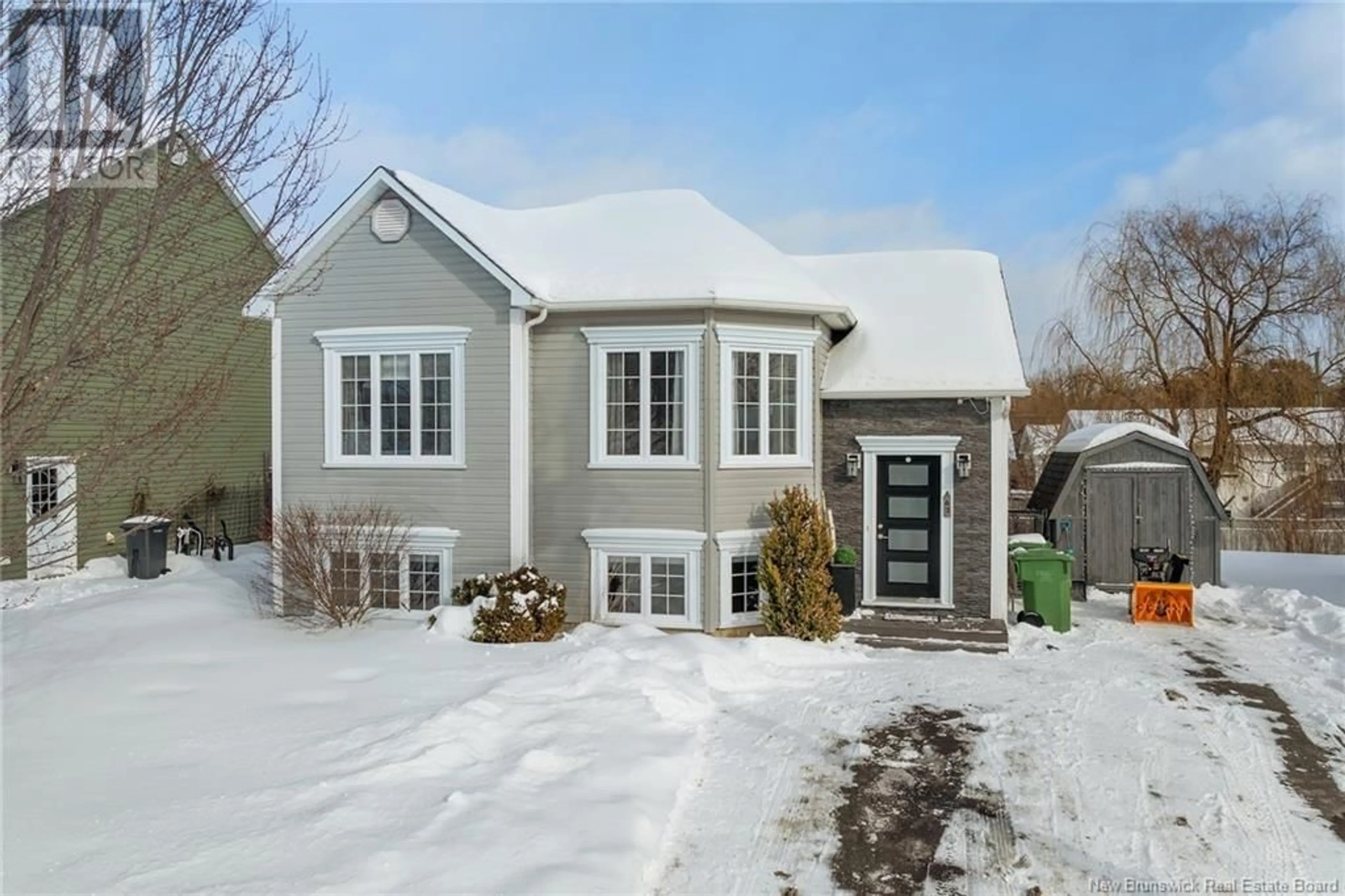 Home with brick exterior material, street for 63 Brandon Court, Fredericton New Brunswick E3G0X5