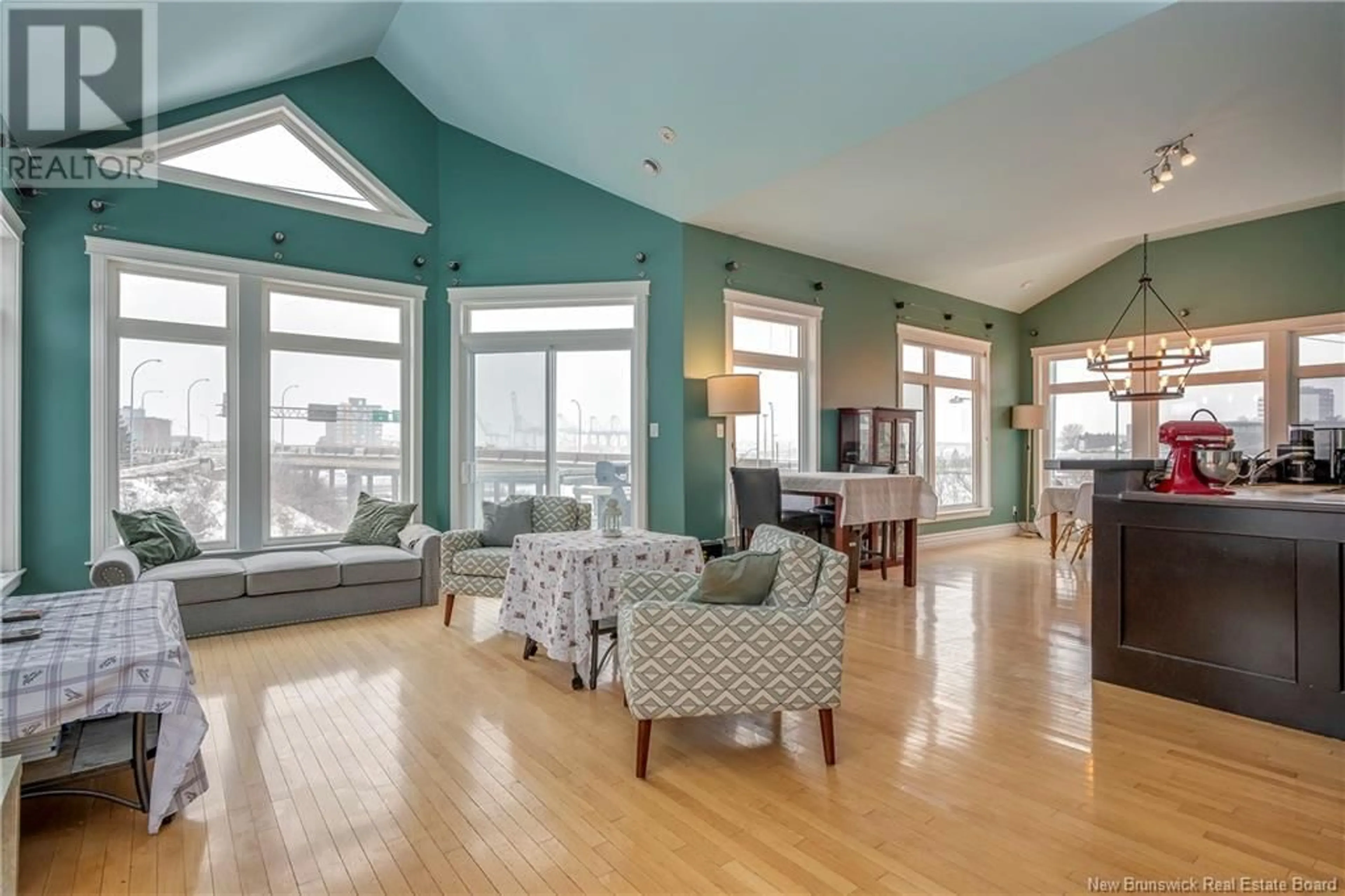 Living room with furniture, wood/laminate floor for 9 Millidge, Saint John New Brunswick E2K0A2