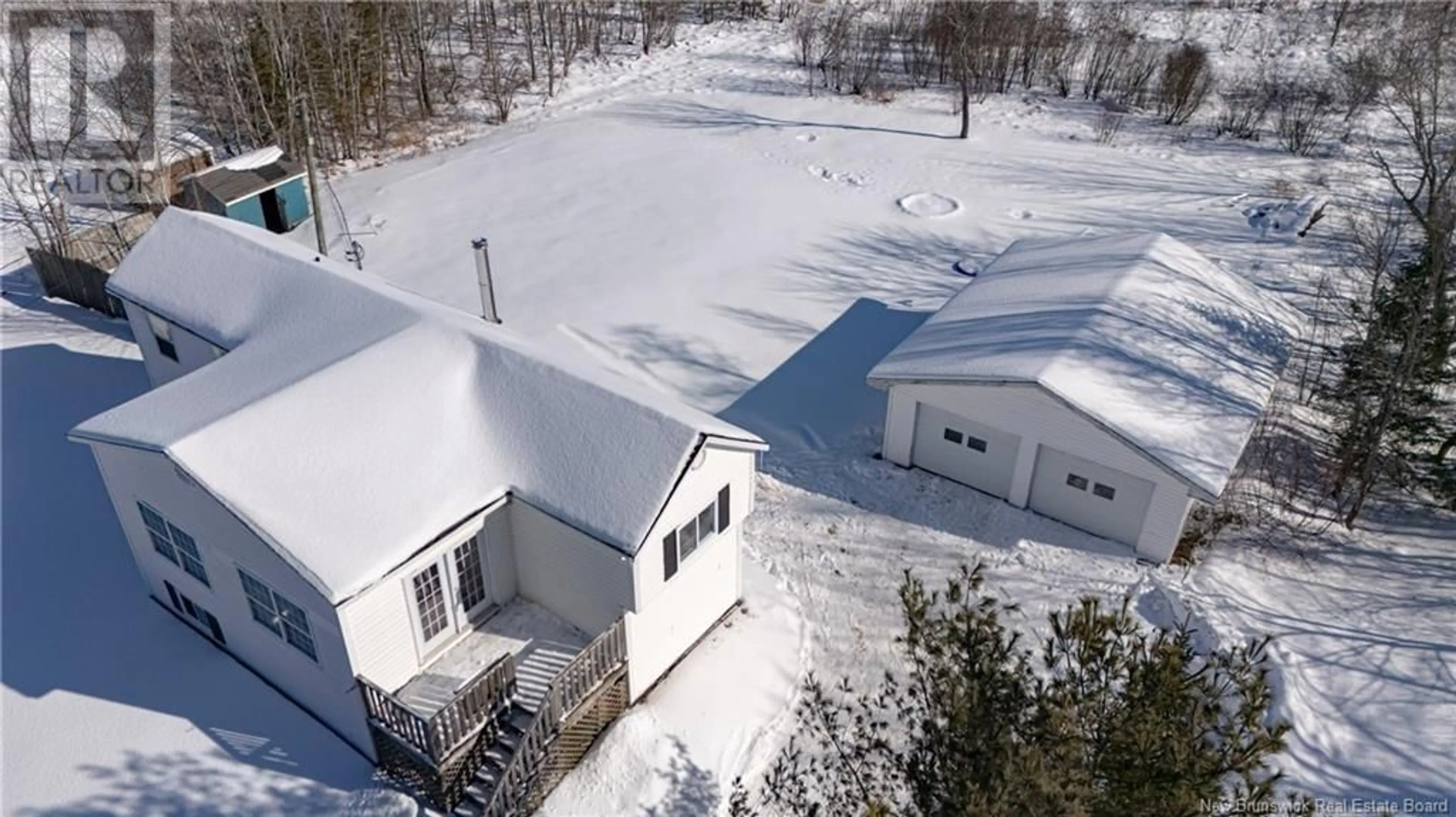 A pic from outside/outdoor area/front of a property/back of a property/a pic from drone, building for 547 Nevers Road, Waasis New Brunswick E3B9C9