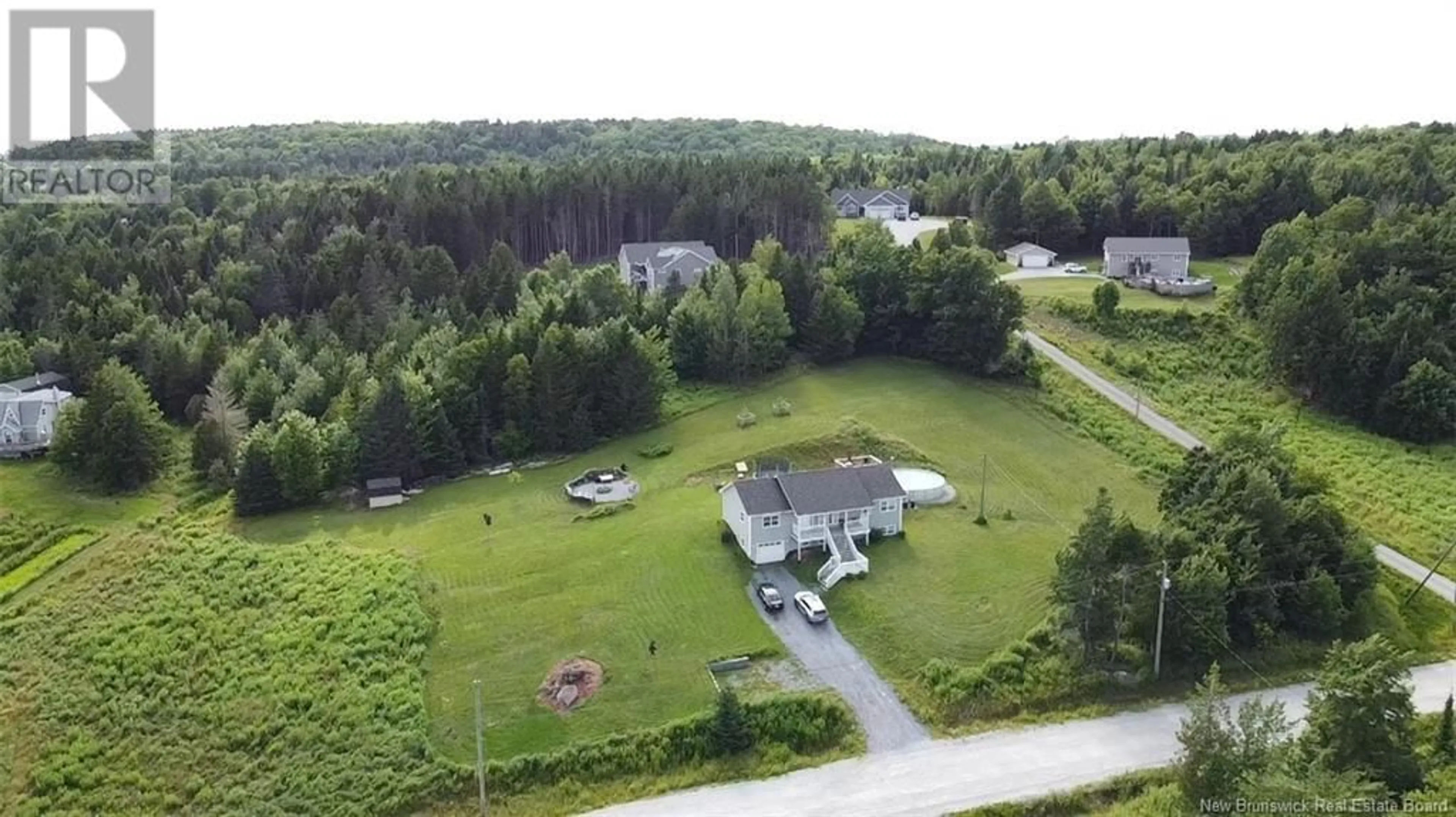 A pic from outside/outdoor area/front of a property/back of a property/a pic from drone, unknown for 13 Beth Lane, Nauwigewauk New Brunswick E5N0C4