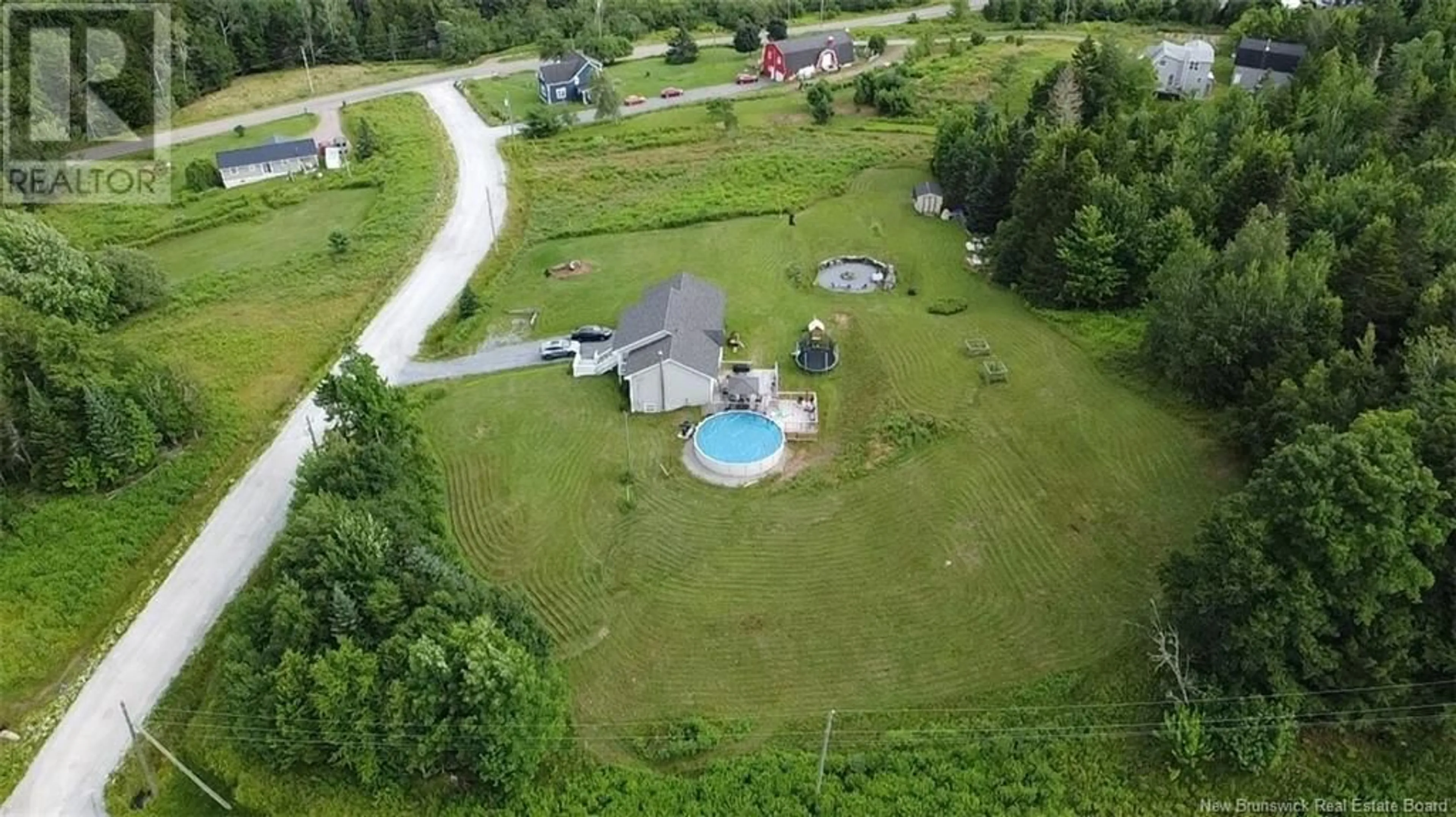 A pic from outside/outdoor area/front of a property/back of a property/a pic from drone, water/lake/river/ocean view for 13 Beth Lane, Nauwigewauk New Brunswick E5N0C4