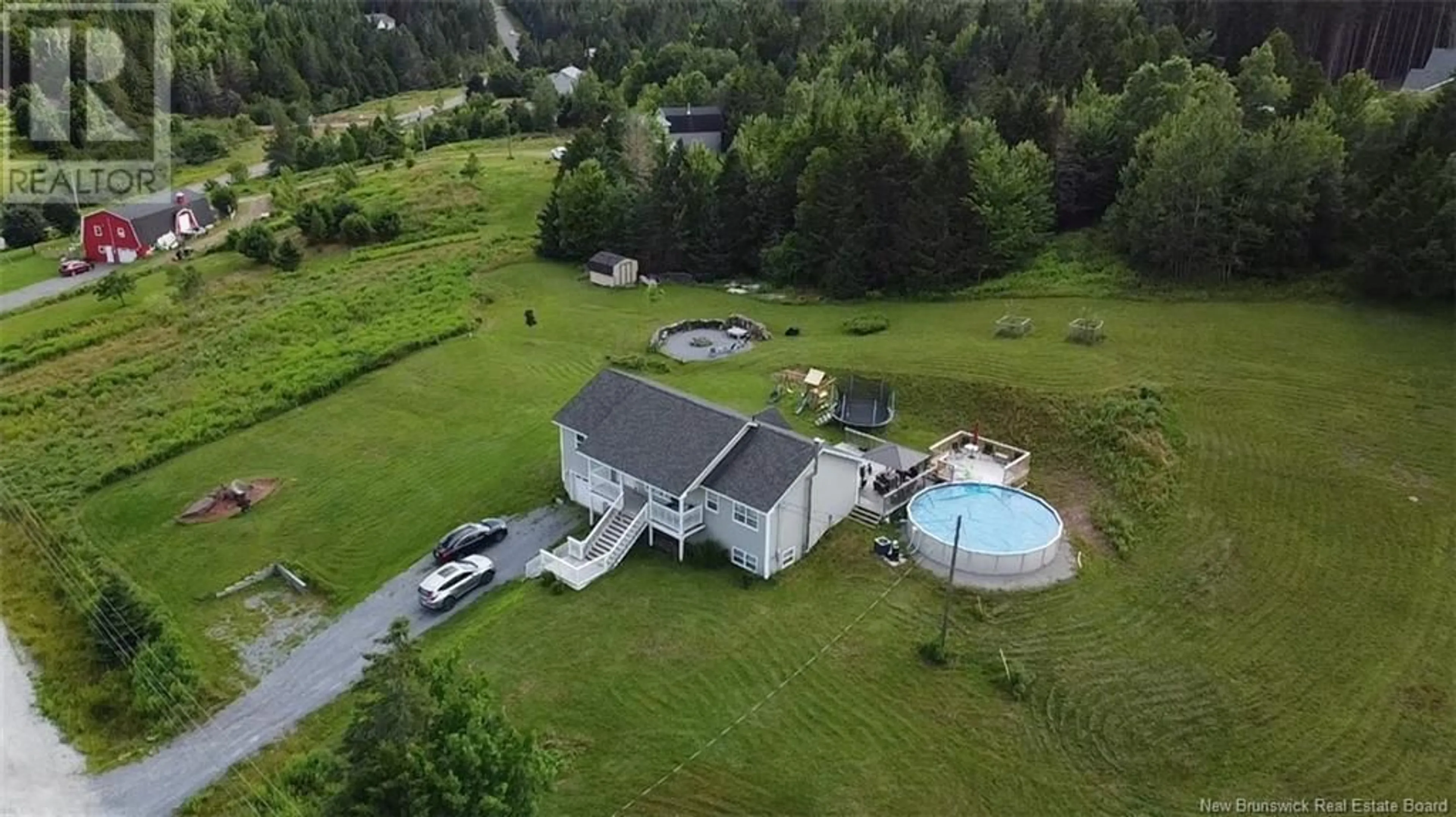 A pic from outside/outdoor area/front of a property/back of a property/a pic from drone, water/lake/river/ocean view for 13 Beth Lane, Nauwigewauk New Brunswick E5N0C4