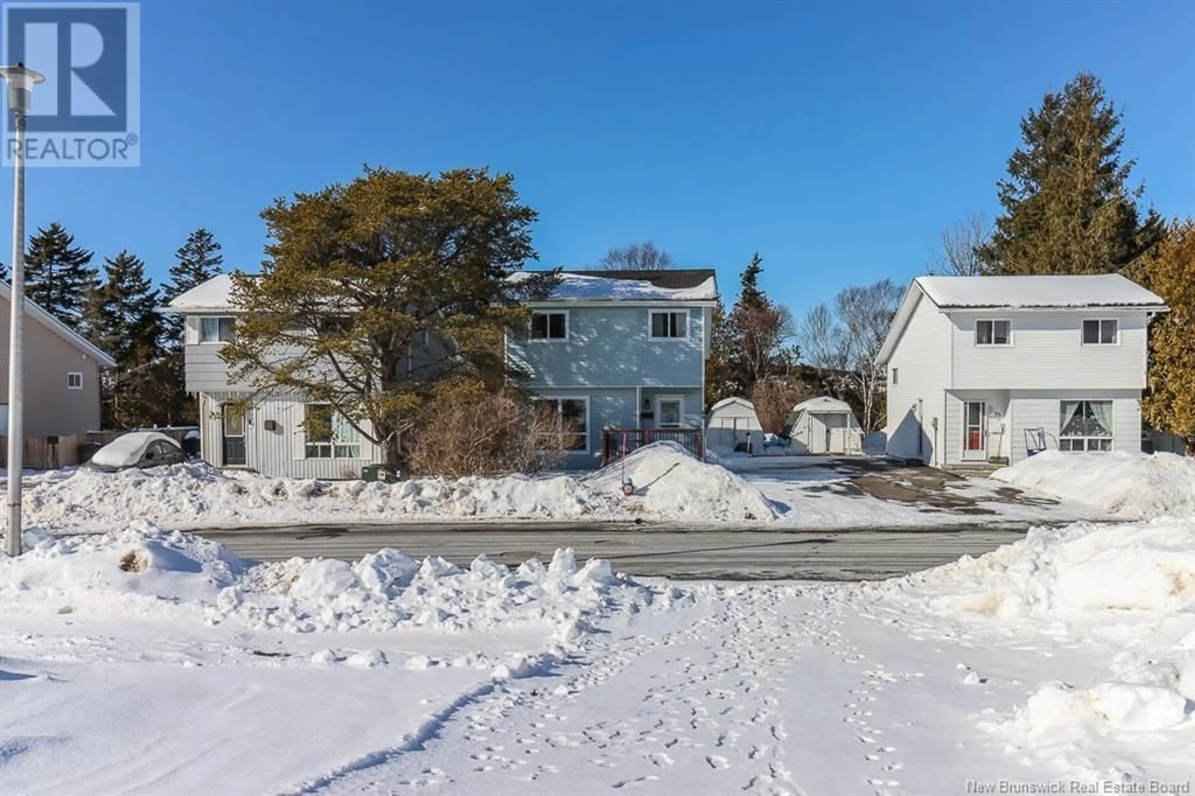 A pic from outside/outdoor area/front of a property/back of a property/a pic from drone, street for 89 Wyatt Crescent, Saint John New Brunswick E2J4C9