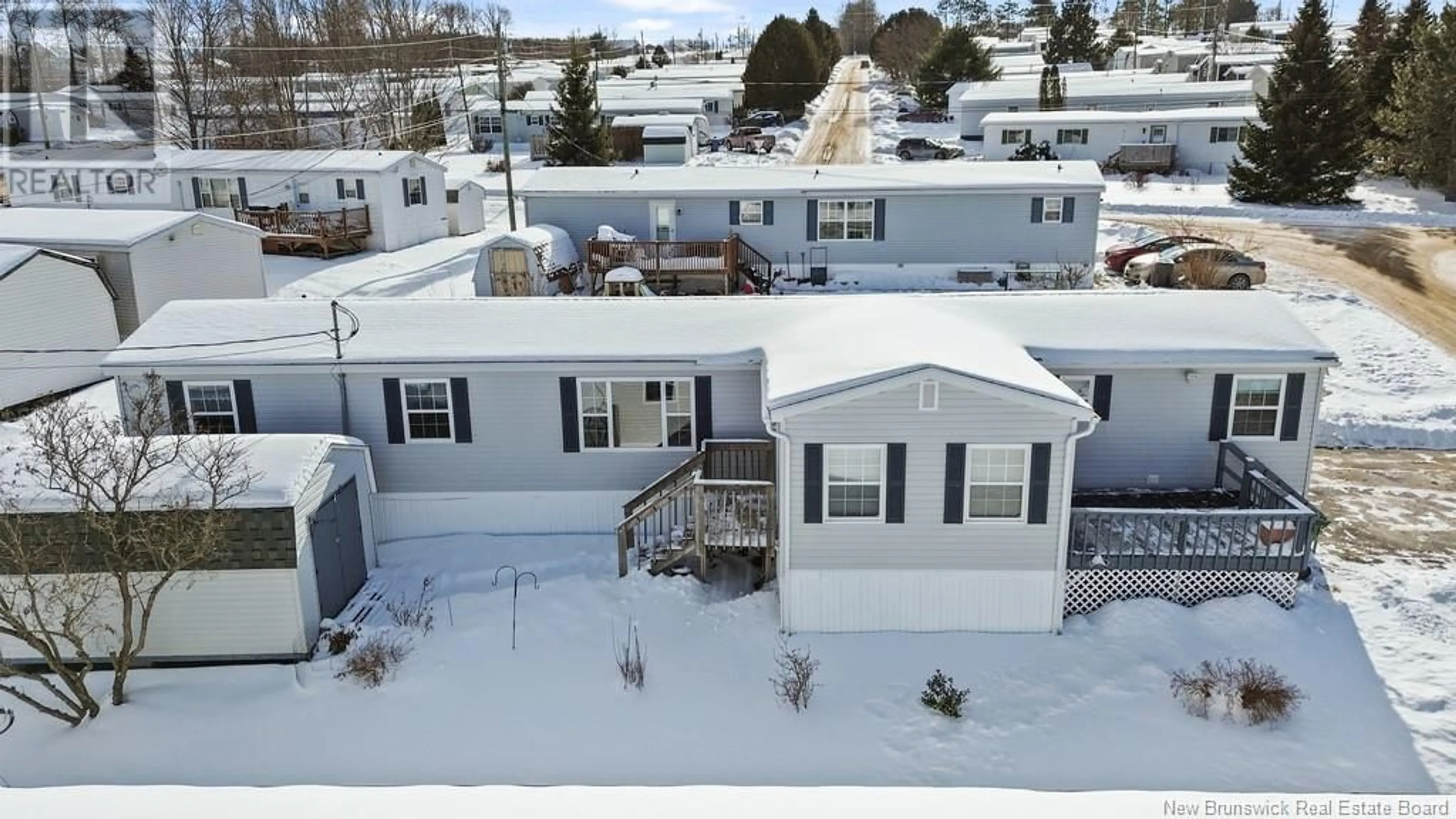 A pic from outside/outdoor area/front of a property/back of a property/a pic from drone, unknown for 8 Todd Street, Fredericton New Brunswick E3C2M9