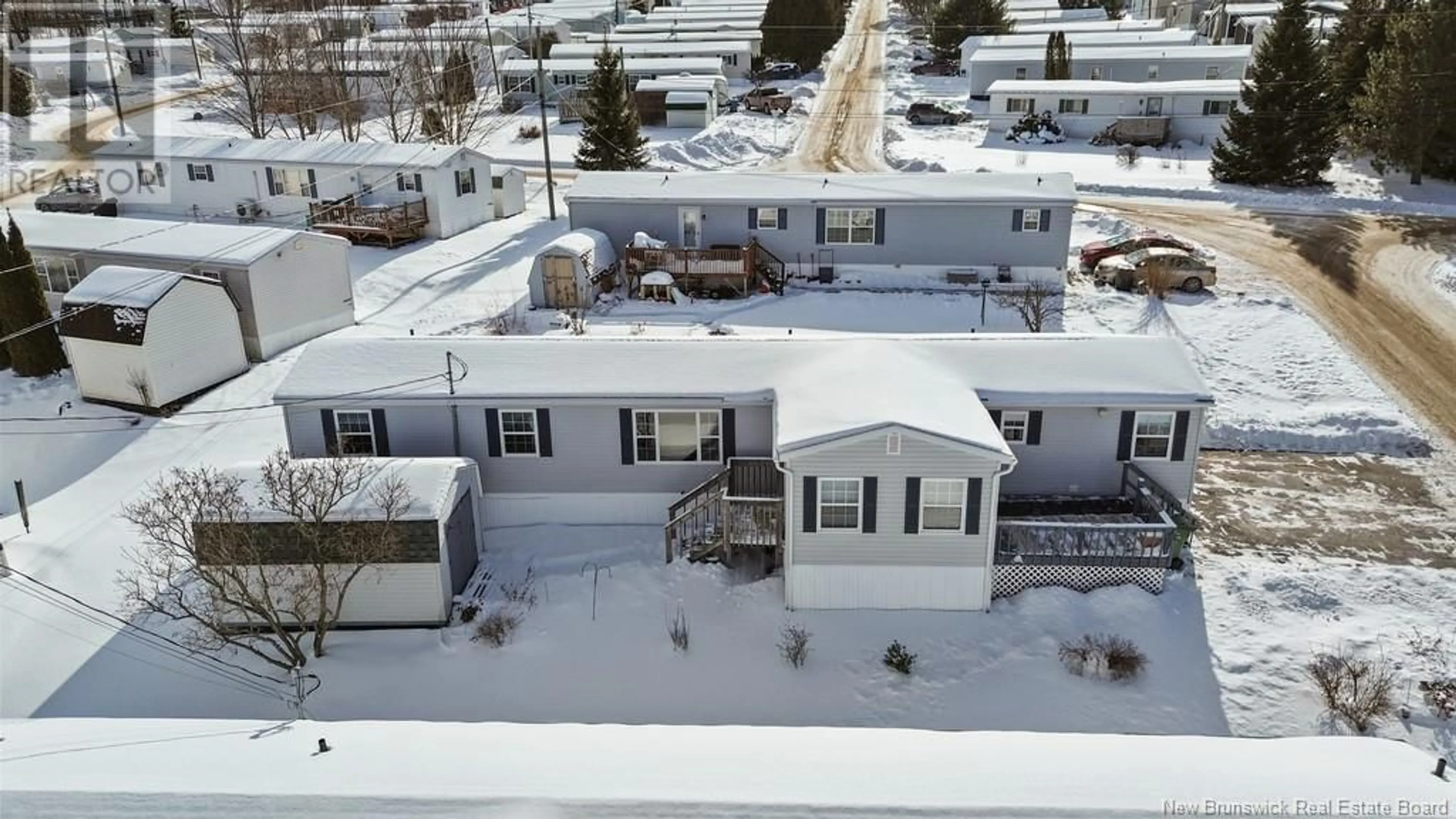 A pic from outside/outdoor area/front of a property/back of a property/a pic from drone, street for 8 Todd Street, Fredericton New Brunswick E3C2M9