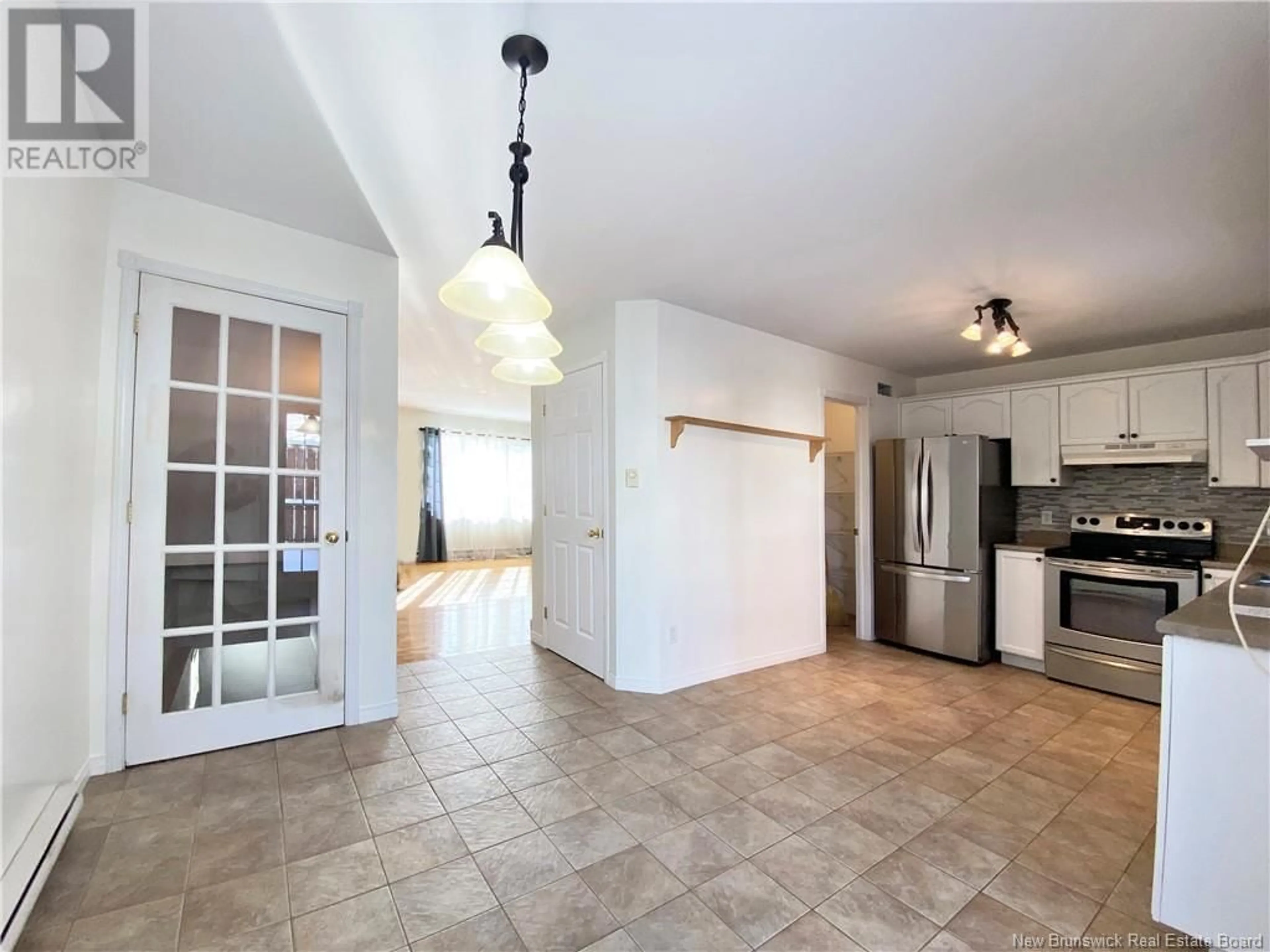 Open concept kitchen, ceramic/tile floor for 37 Old Orchard Lane, Riverview New Brunswick E1B5M5