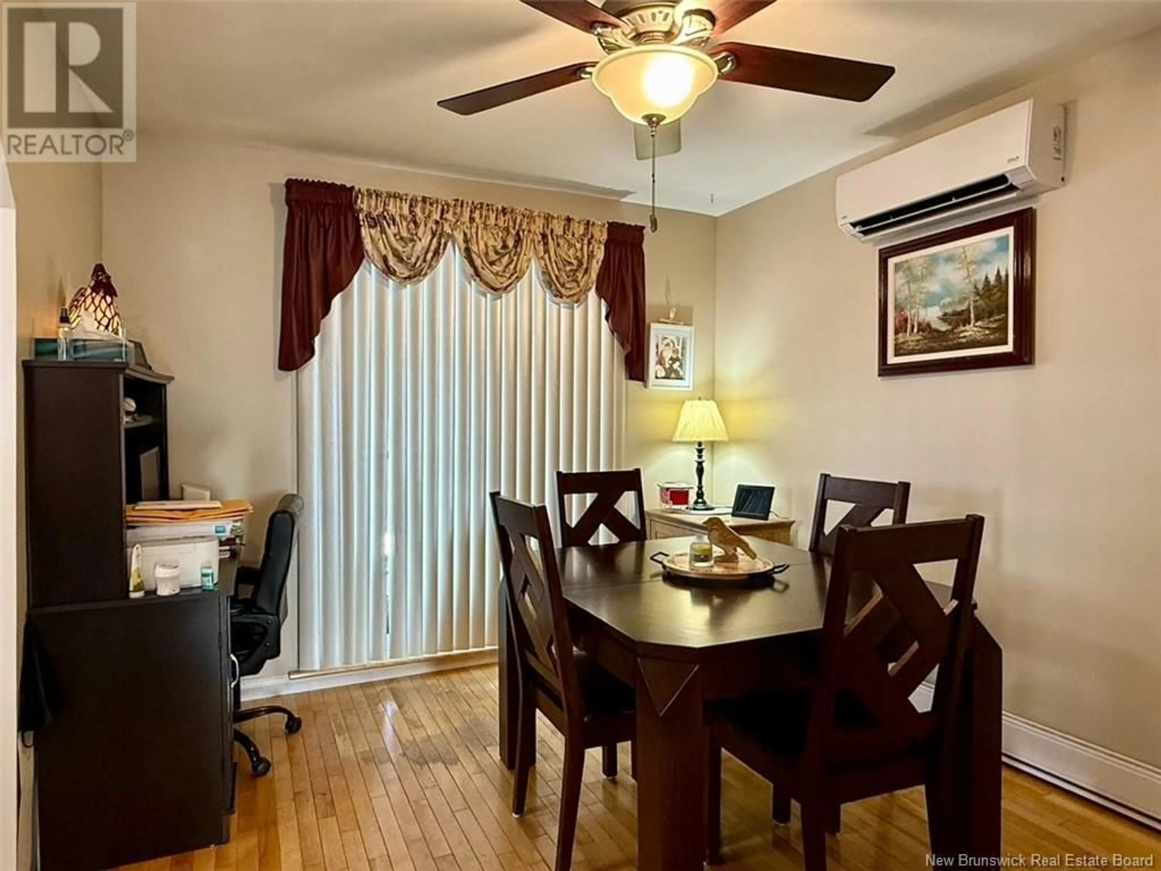 Dining room, wood/laminate floor for 61 Victoria Street, Campbellton New Brunswick E3N1J3