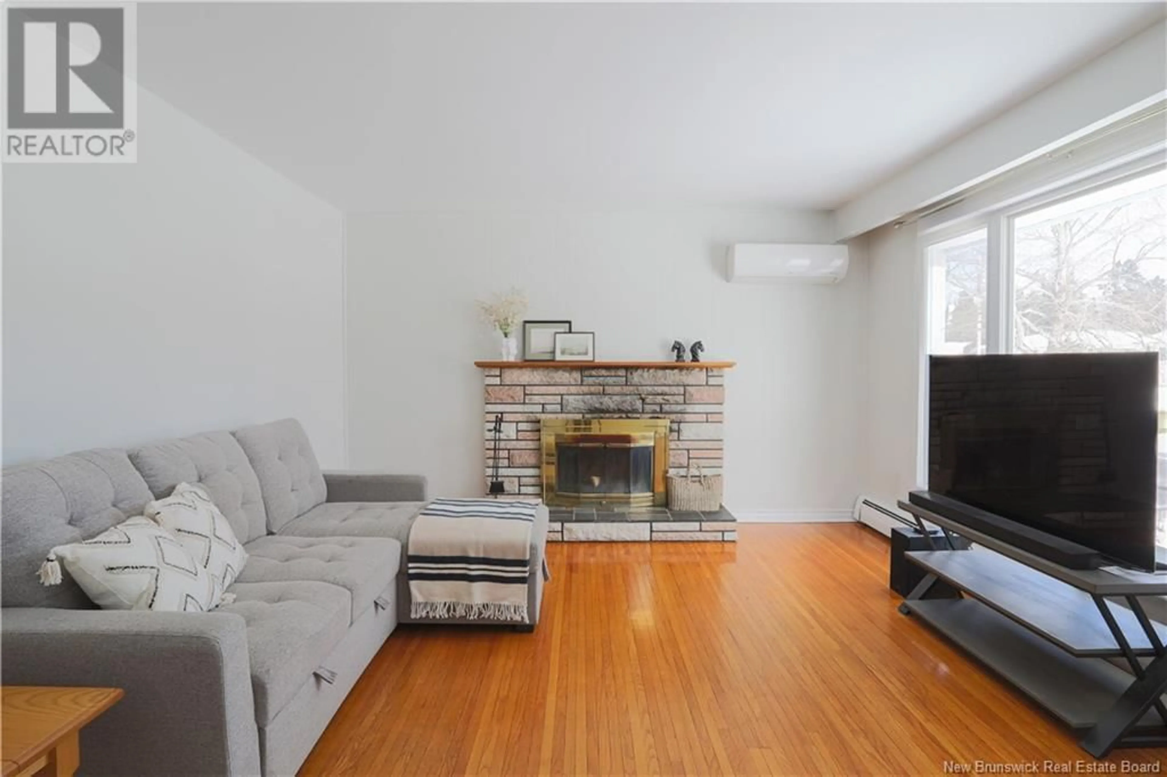 Living room with furniture, wood/laminate floor for 78 Sherwood Drive, Saint John New Brunswick E2J3H8