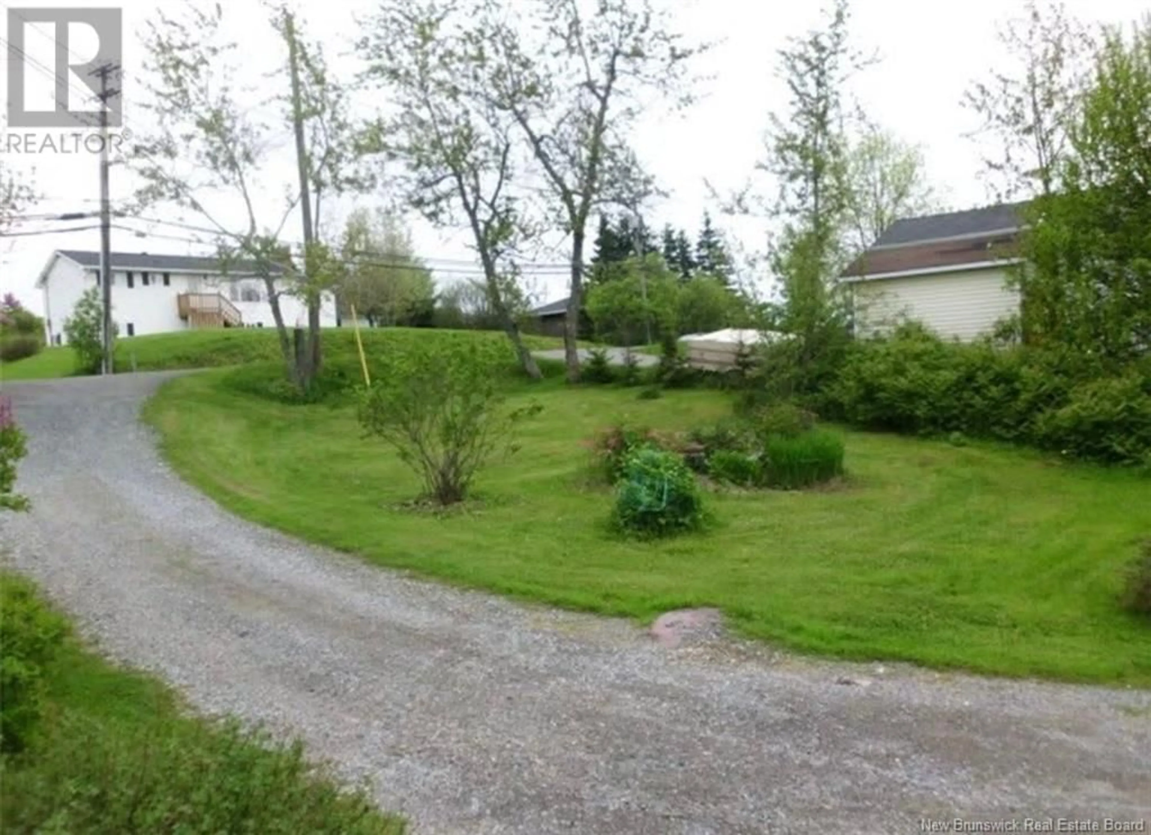 A pic from outside/outdoor area/front of a property/back of a property/a pic from drone, street for 243 Golden Grove Road, Saint John New Brunswick E2H1X3