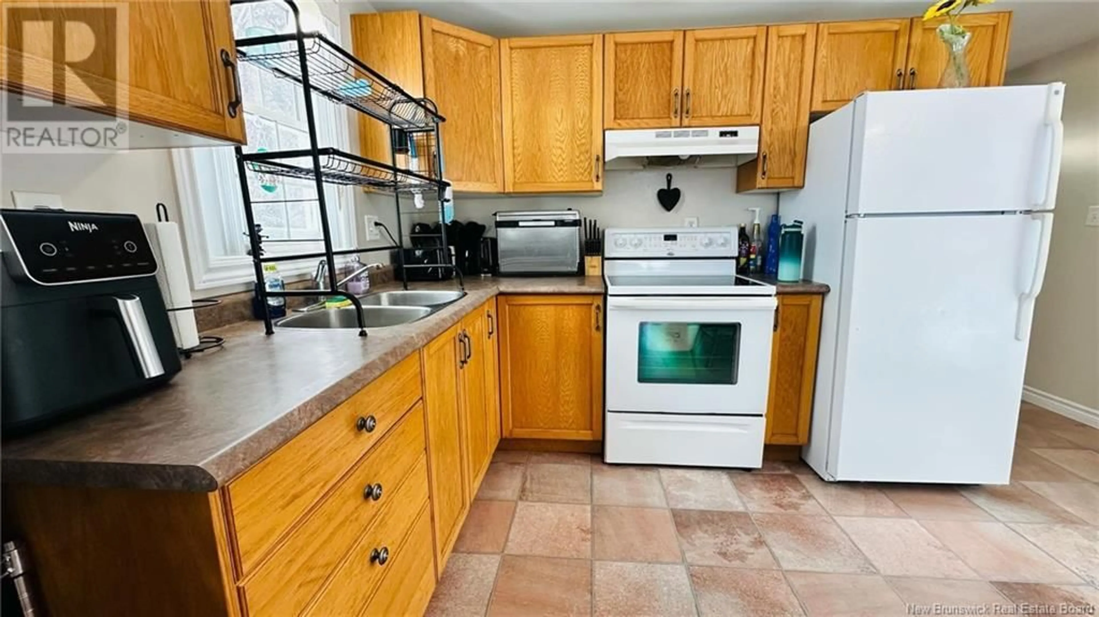 Standard kitchen, ceramic/tile floor for 19 Ch Saint-Pierre Road, Rogersville New Brunswick E4Y1L3