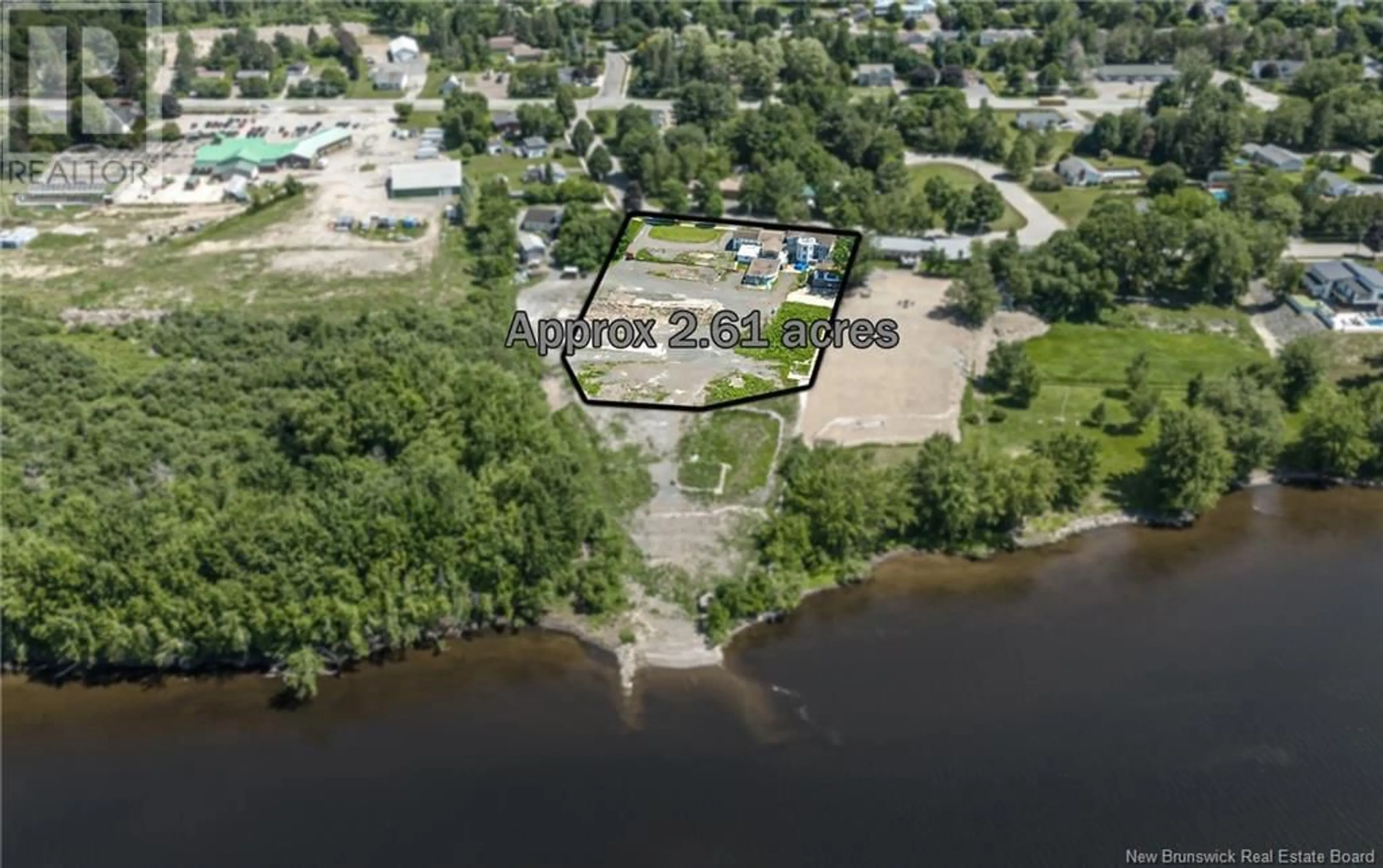 A pic from outside/outdoor area/front of a property/back of a property/a pic from drone, water/lake/river/ocean view for 59-69 Ross Terrace, Fredericton New Brunswick W3A8E5