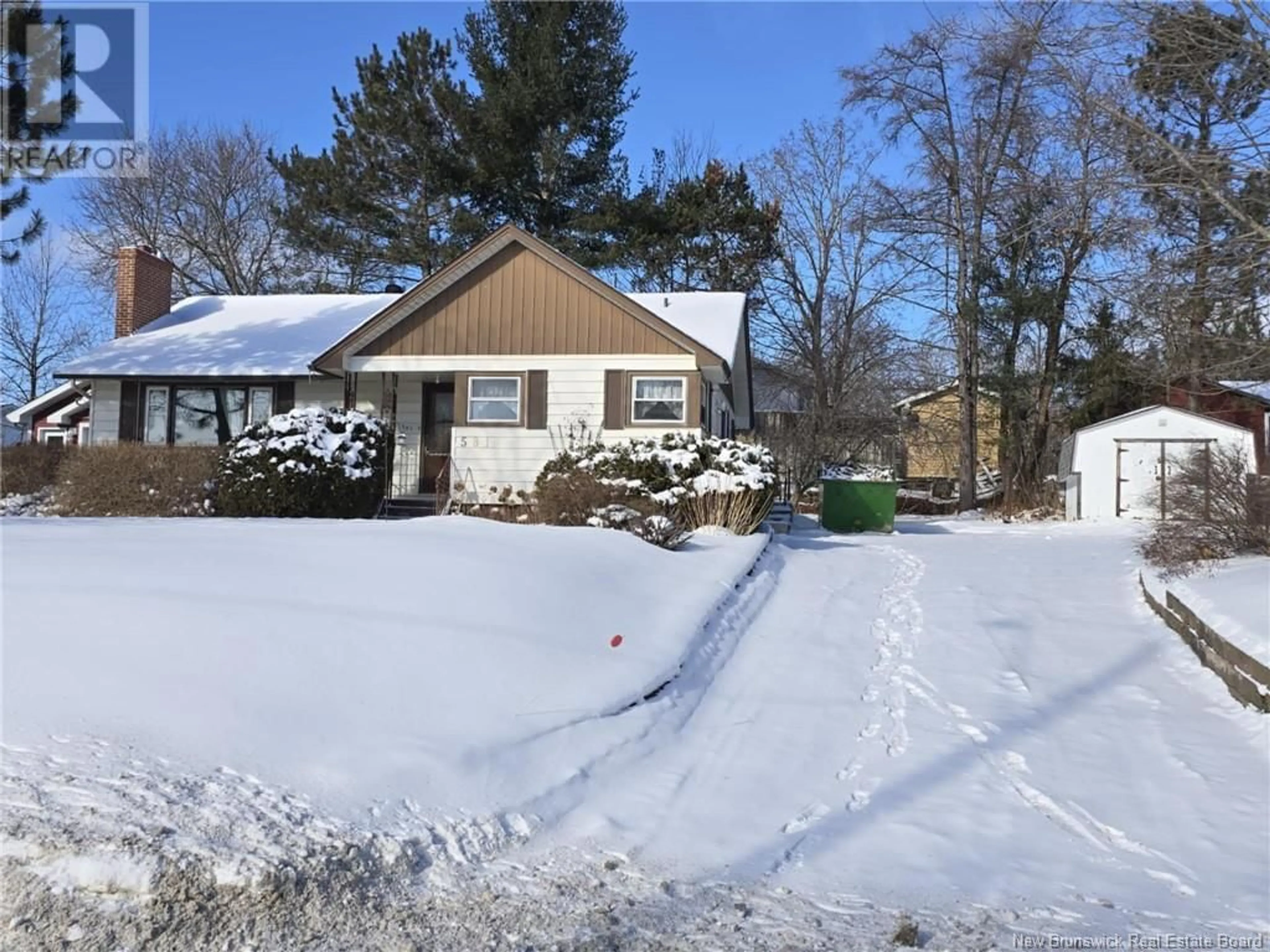 A pic from outside/outdoor area/front of a property/back of a property/a pic from drone, street for 581 & 583 Old King George Hwy, Miramichi New Brunswick E1V1K3