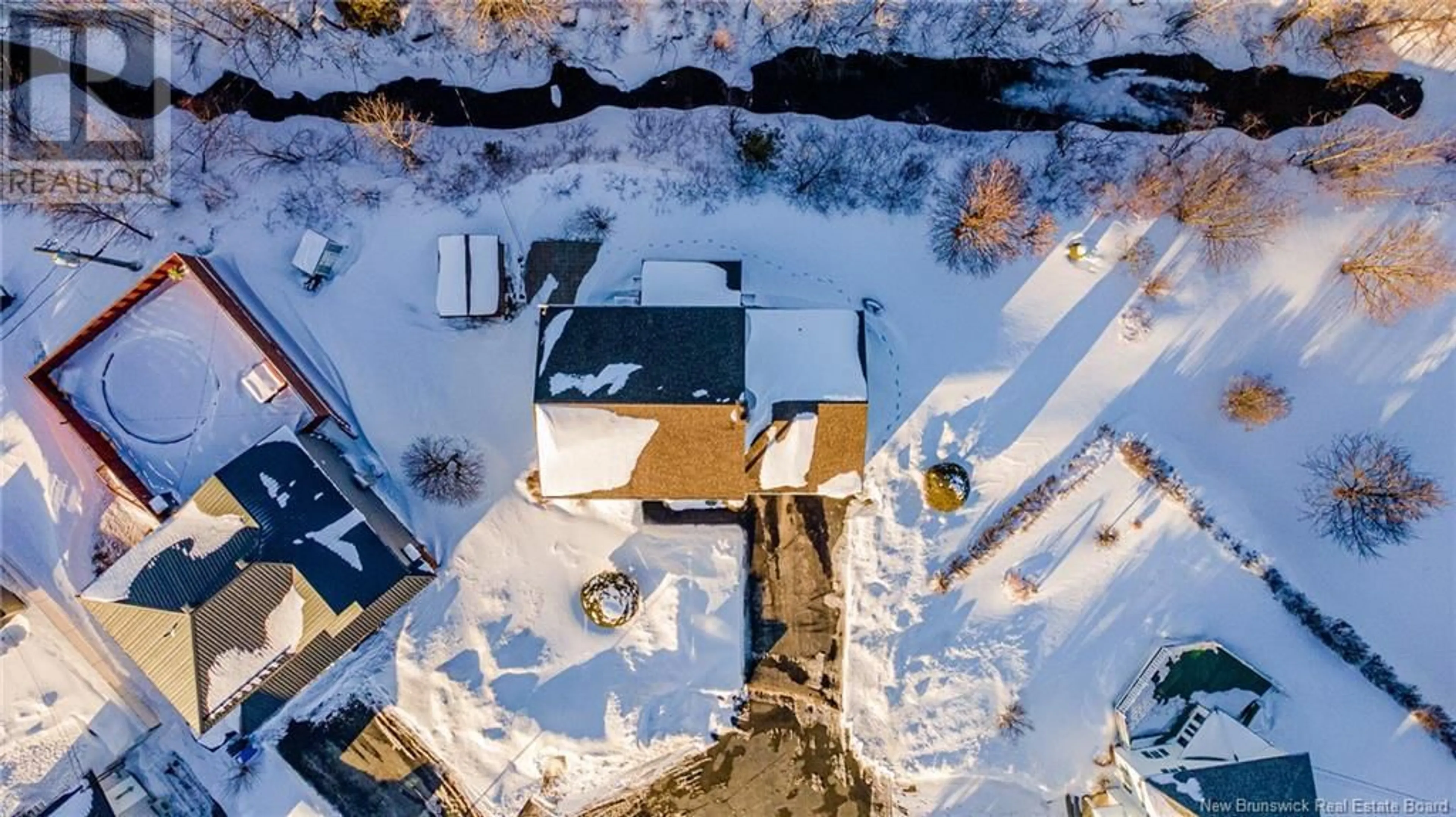 A pic from outside/outdoor area/front of a property/back of a property/a pic from drone, street for 8 Aspen Drive, Campbellton New Brunswick E3N3S9