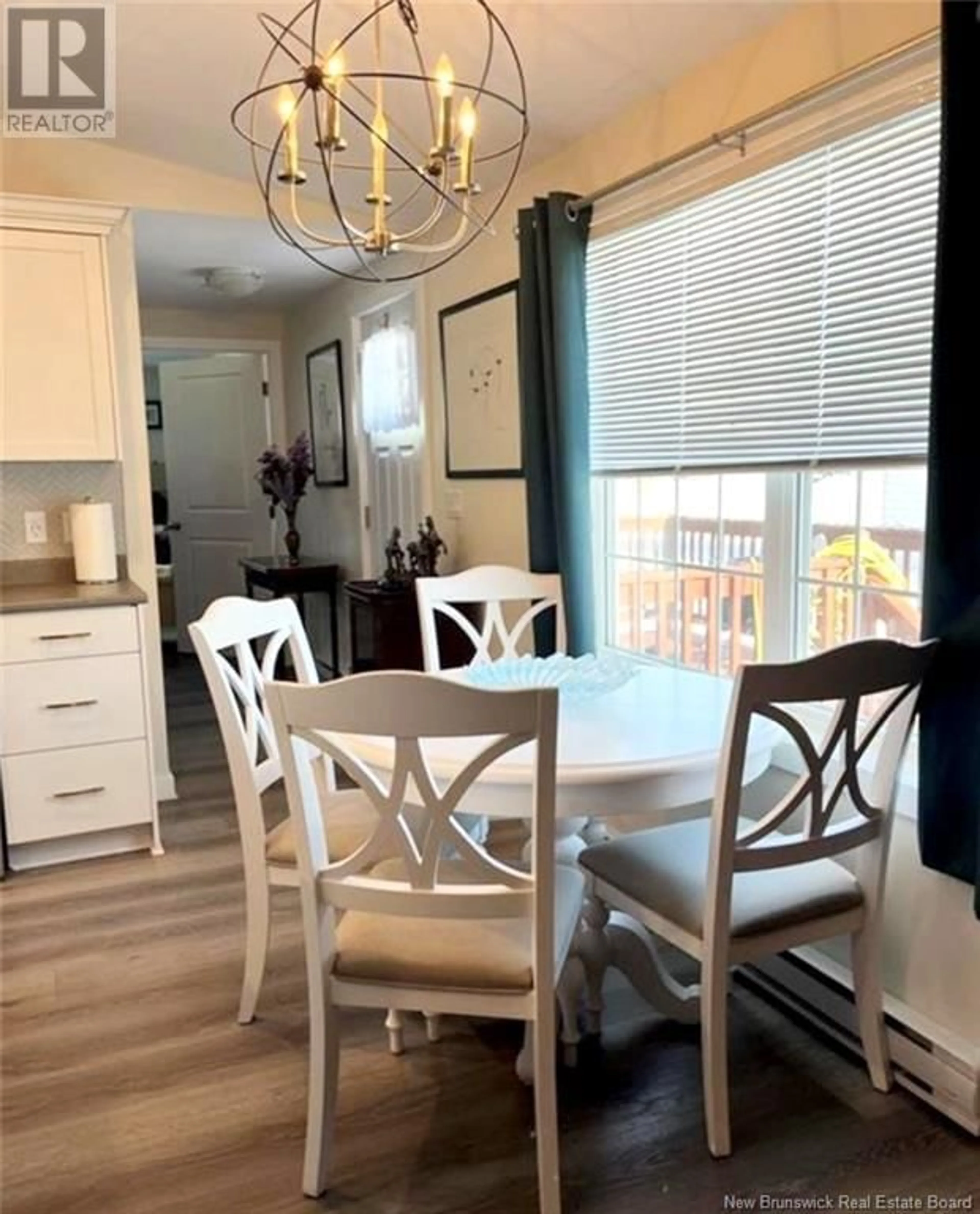 Dining room, wood/laminate floor for 18 Crosby Crescent, Miramichi New Brunswick E1N3C6