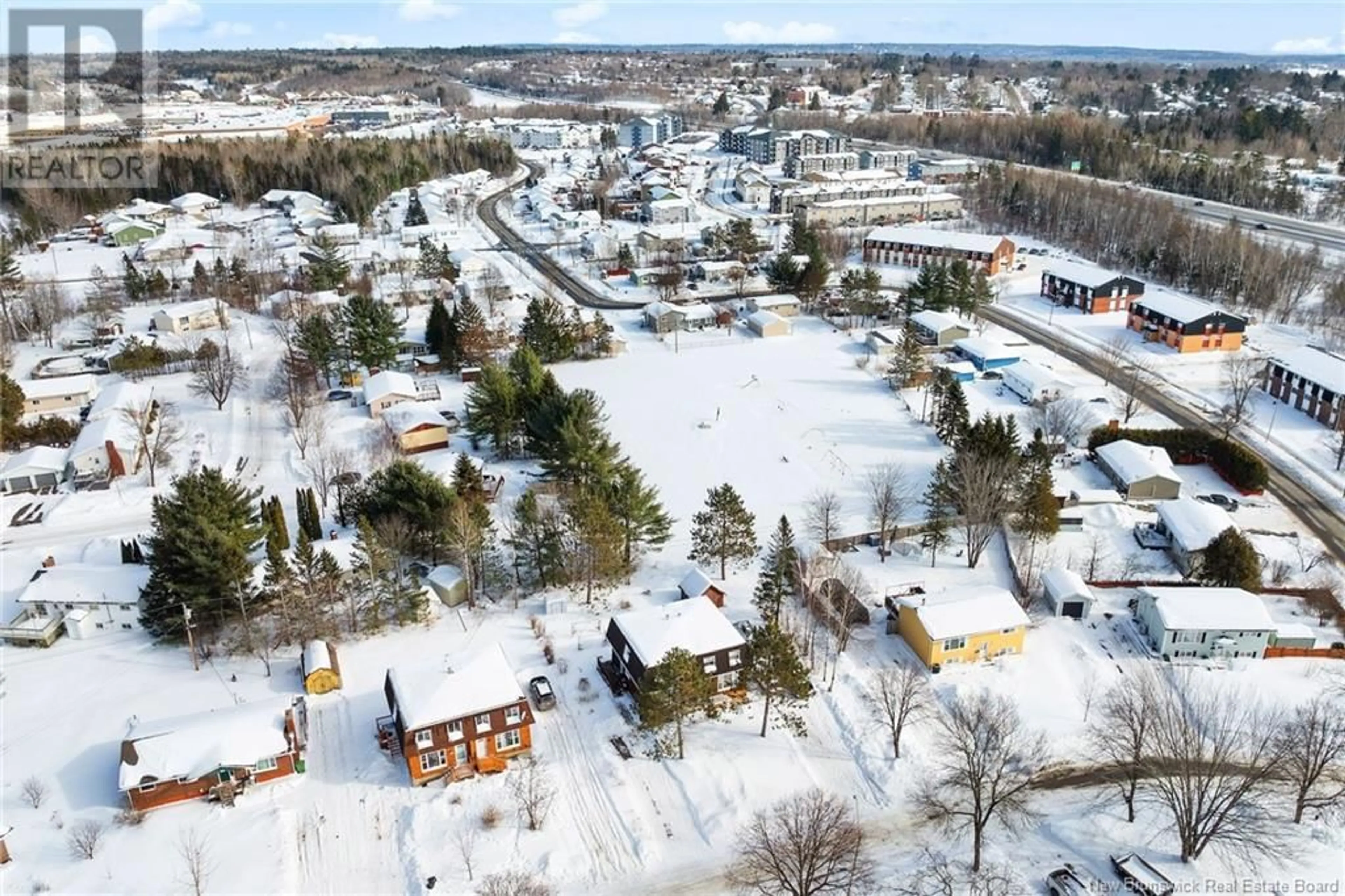 A pic from outside/outdoor area/front of a property/back of a property/a pic from drone, street for 65 Jenning Drive, Fredericton New Brunswick E3A4X9