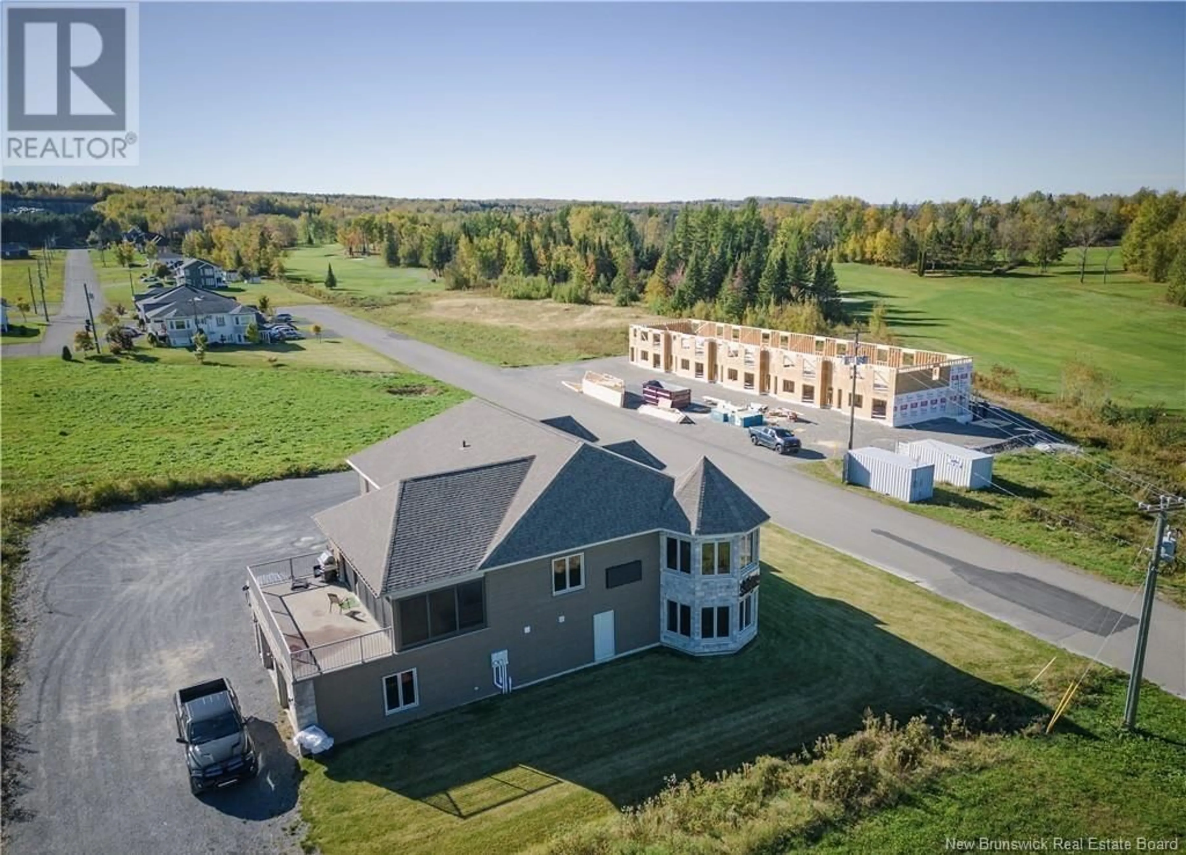 A pic from outside/outdoor area/front of a property/back of a property/a pic from drone, unknown for 15 & 17 Harrison Street, Grand Falls New Brunswick E3Z0B3