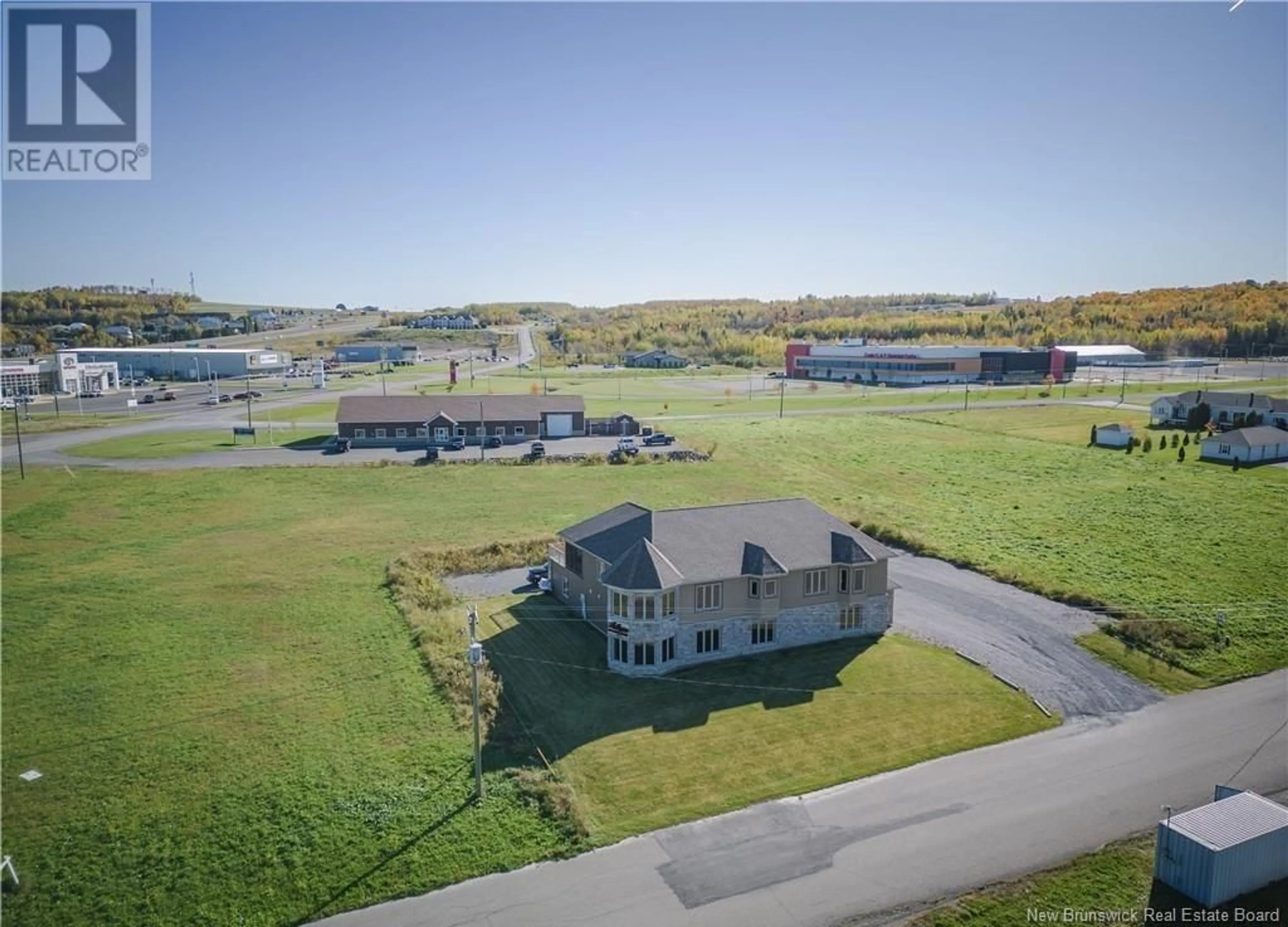 A pic from outside/outdoor area/front of a property/back of a property/a pic from drone, water/lake/river/ocean view for 15 & 17 Harrison Street, Grand Falls New Brunswick E3Z0B3