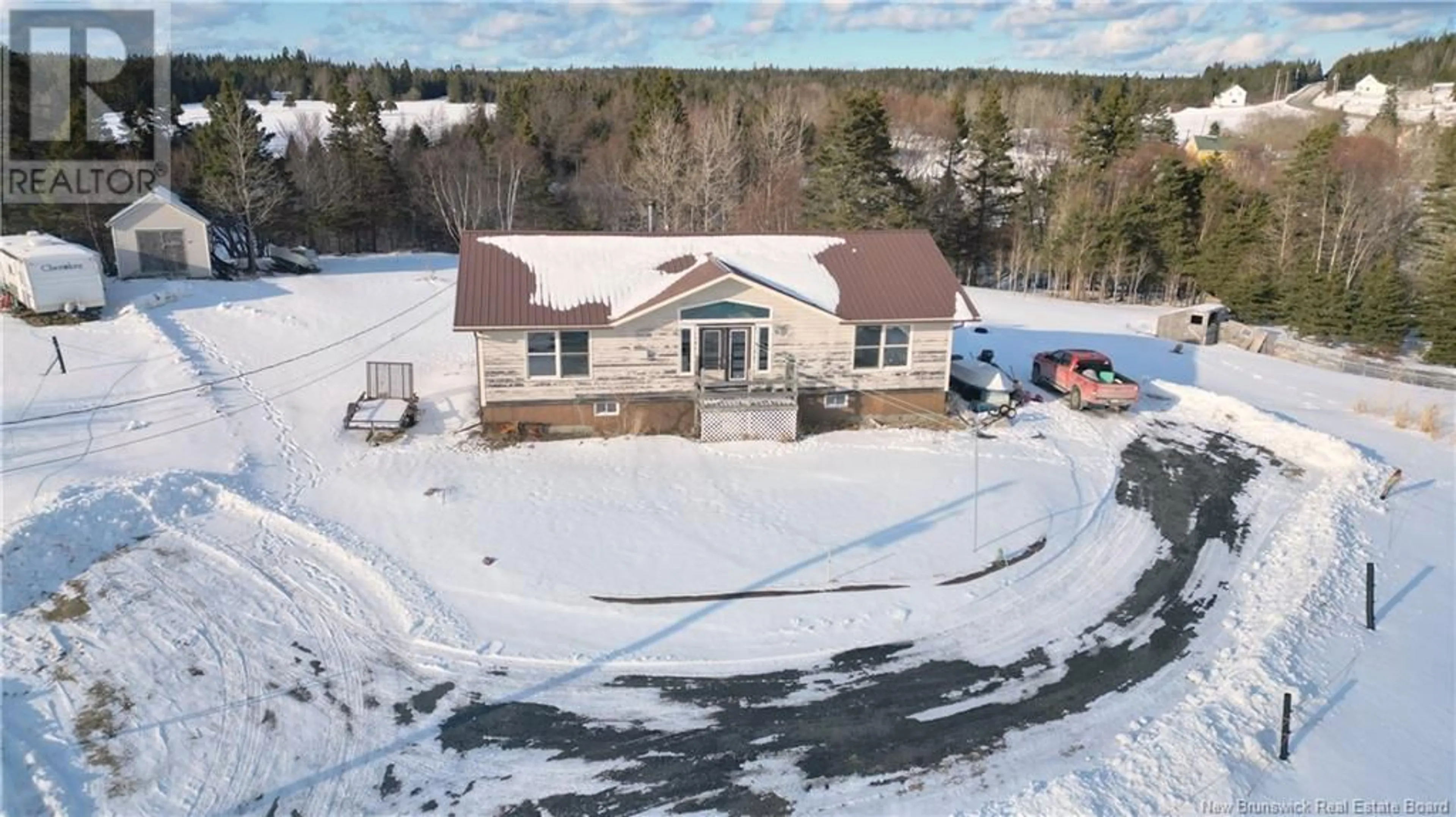 A pic from outside/outdoor area/front of a property/back of a property/a pic from drone, building for 8 King Street, Grand Manan New Brunswick E5G3J1