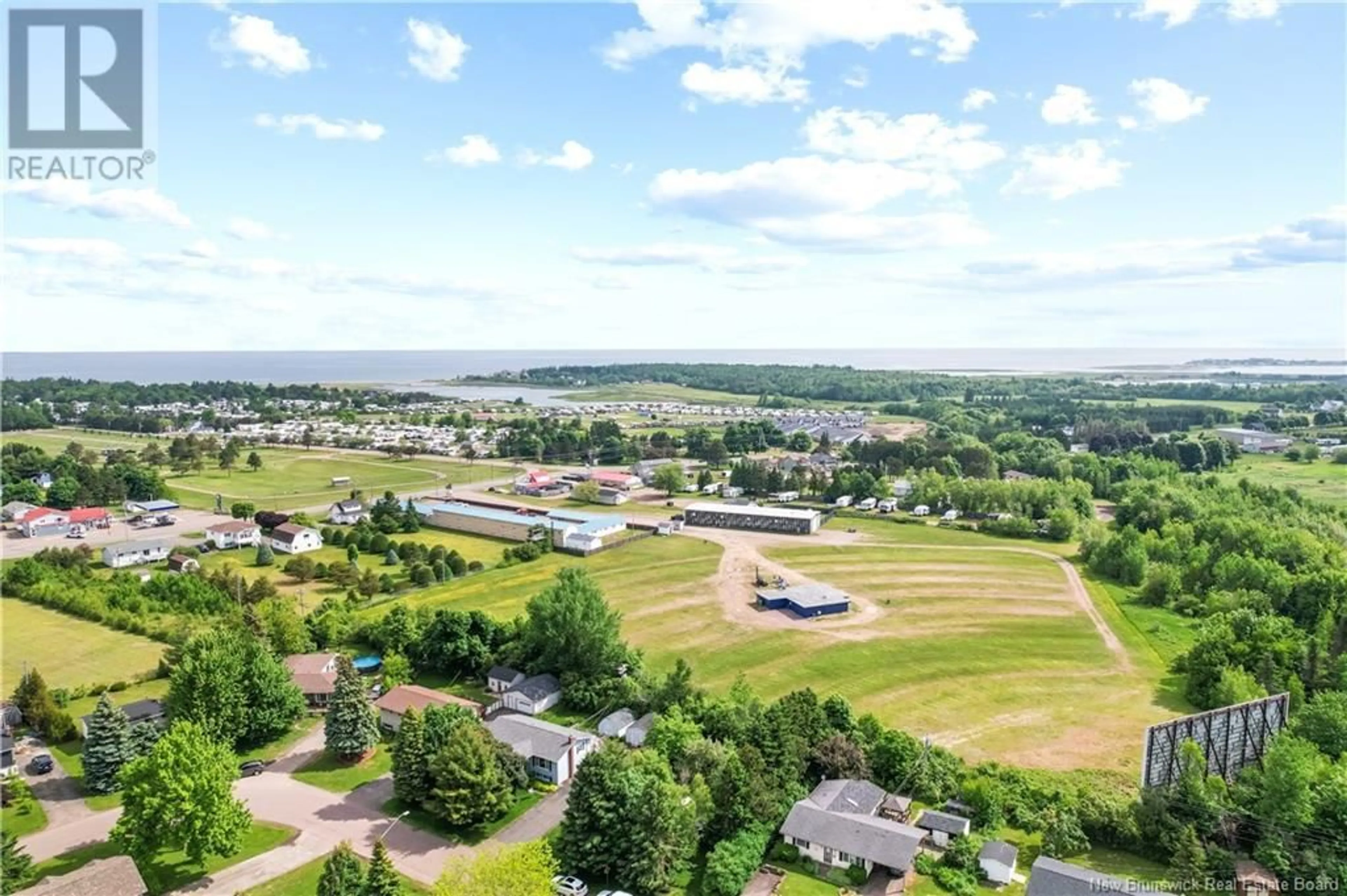 A pic from outside/outdoor area/front of a property/back of a property/a pic from drone, water/lake/river/ocean view for 90 Cartier, Shediac New Brunswick E4P1L3