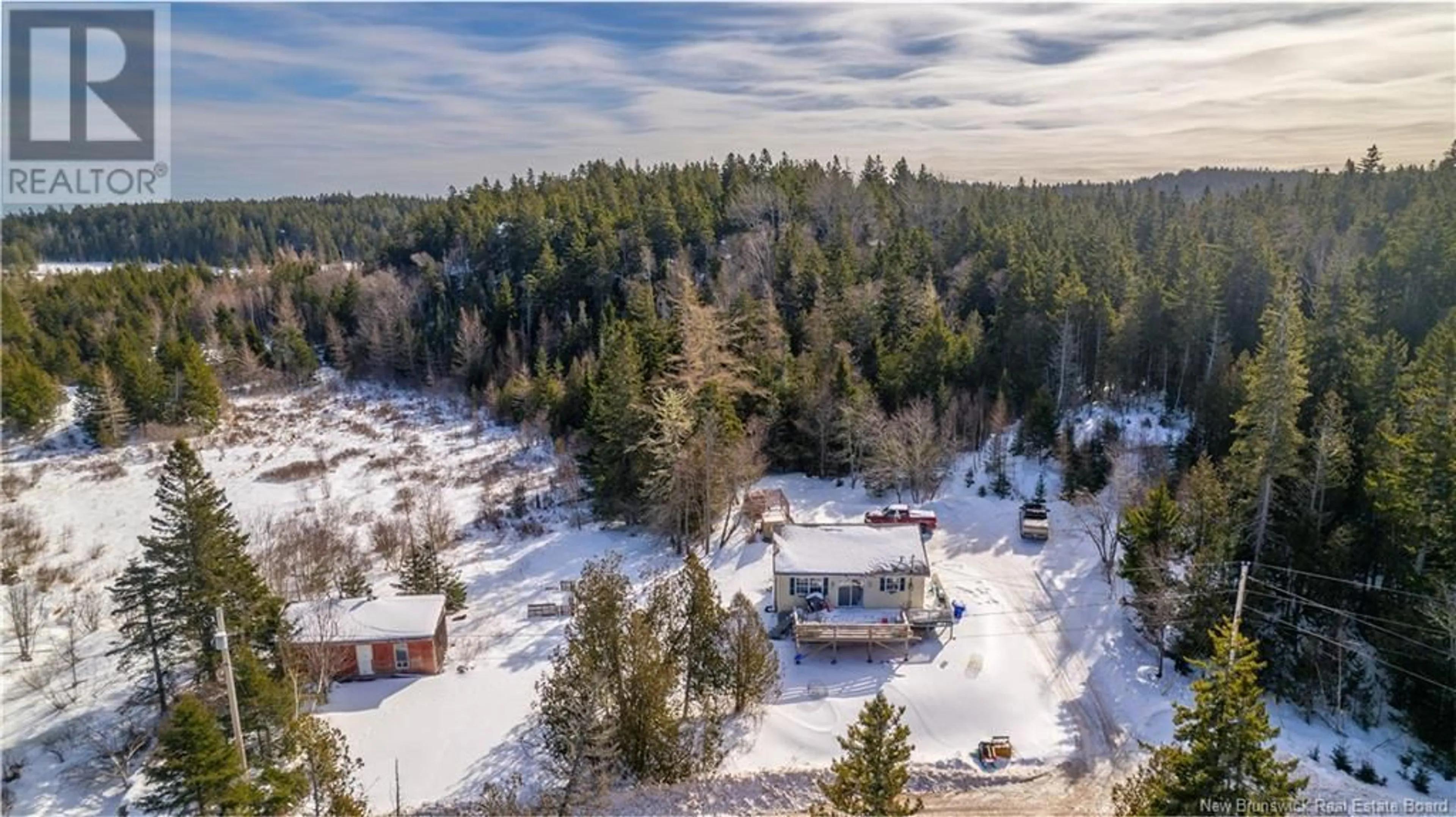 A pic from outside/outdoor area/front of a property/back of a property/a pic from drone, forest/trees view for 120 Hersonville Road, Lamberts Cove New Brunswick E5V1C6