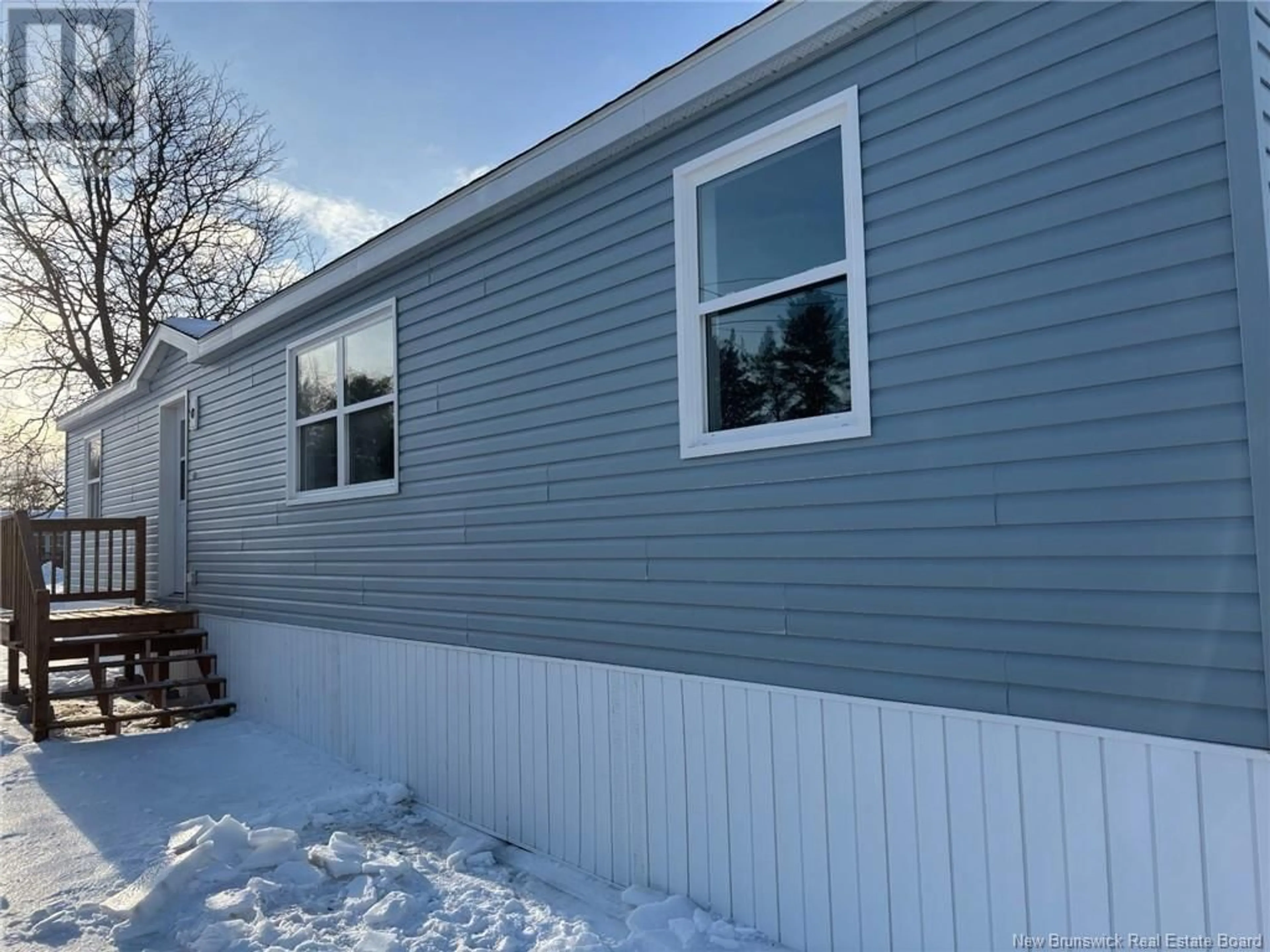 Home with vinyl exterior material, street for 8 Fraser, St. Stephen New Brunswick E3L4B8