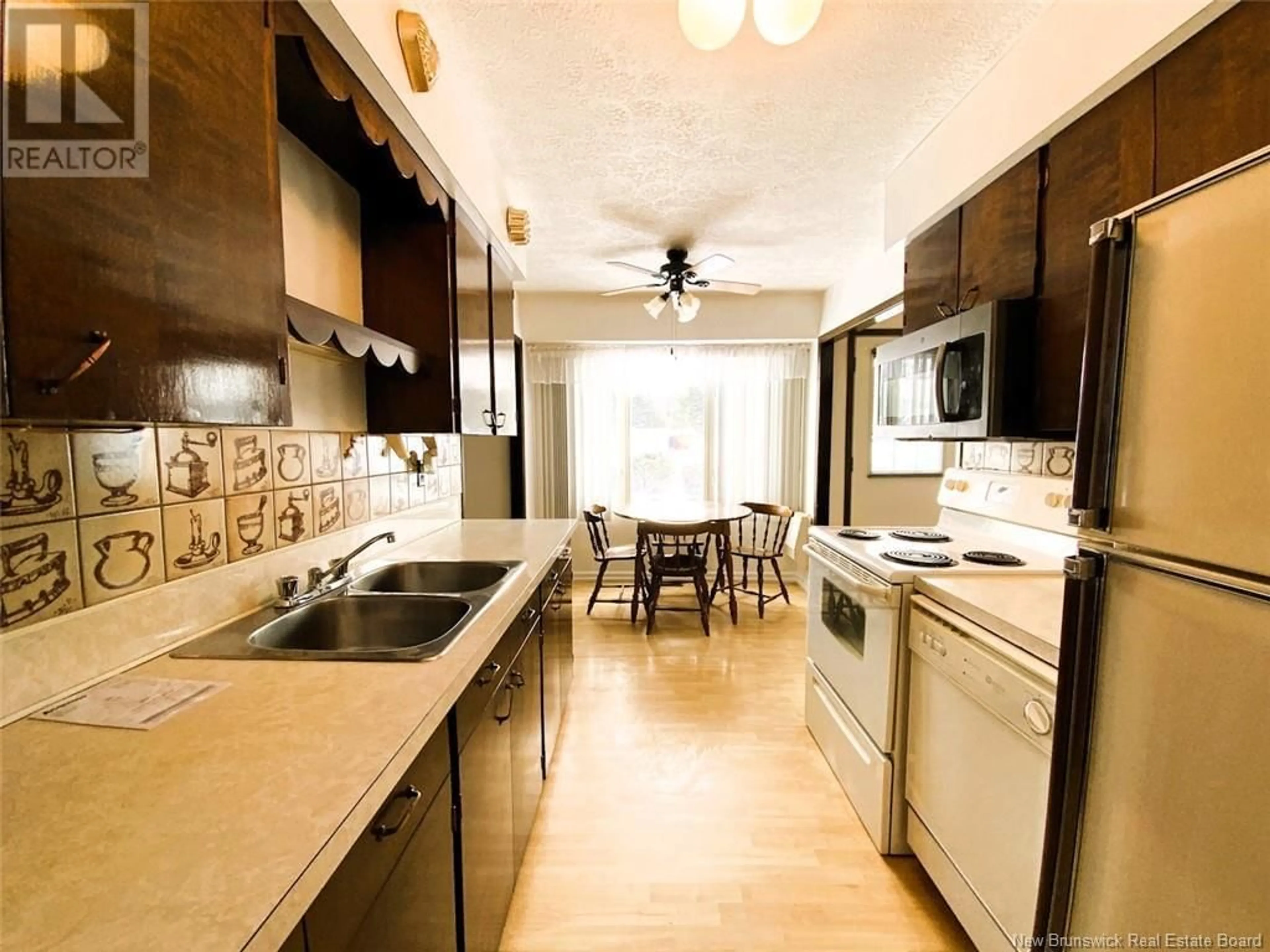 Open concept kitchen, unknown for 24 Lebel Street, Saint-François-de-Madawaska New Brunswick E7A1E2