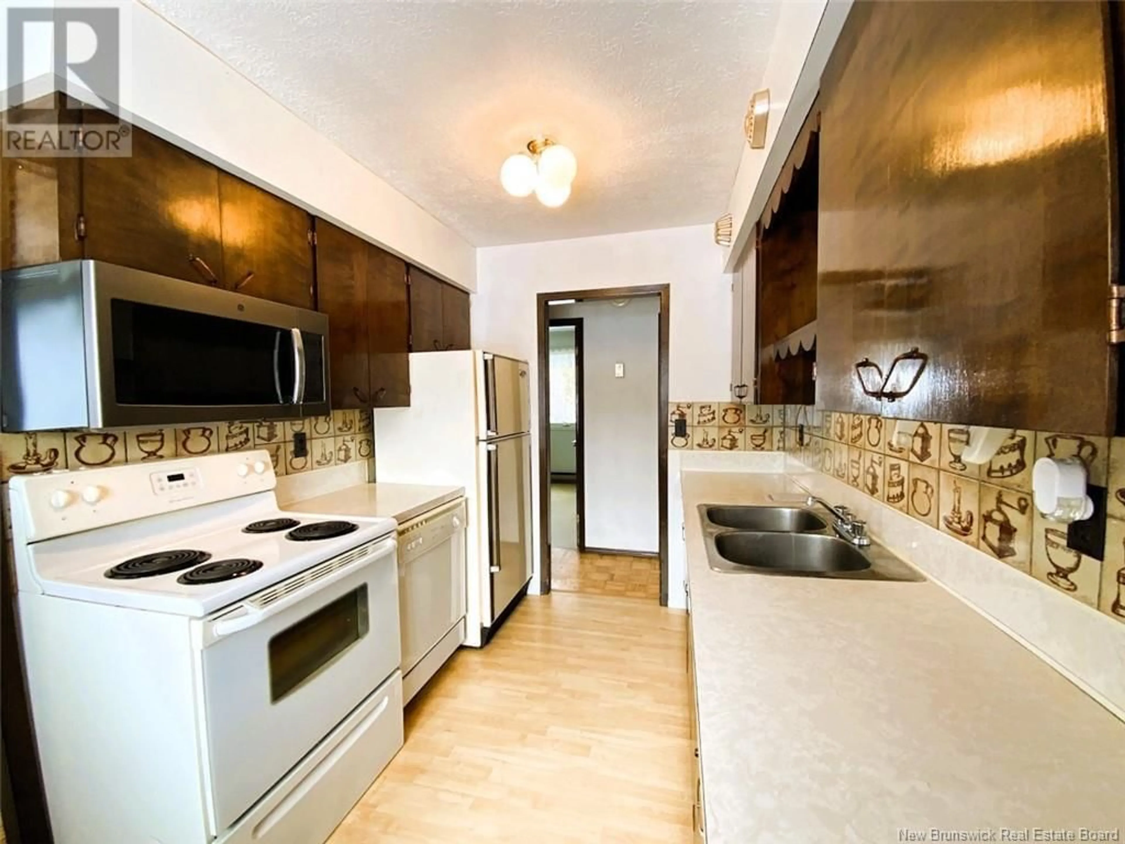 Standard kitchen, ceramic/tile floor for 24 Lebel Street, Saint-François-de-Madawaska New Brunswick E7A1E2