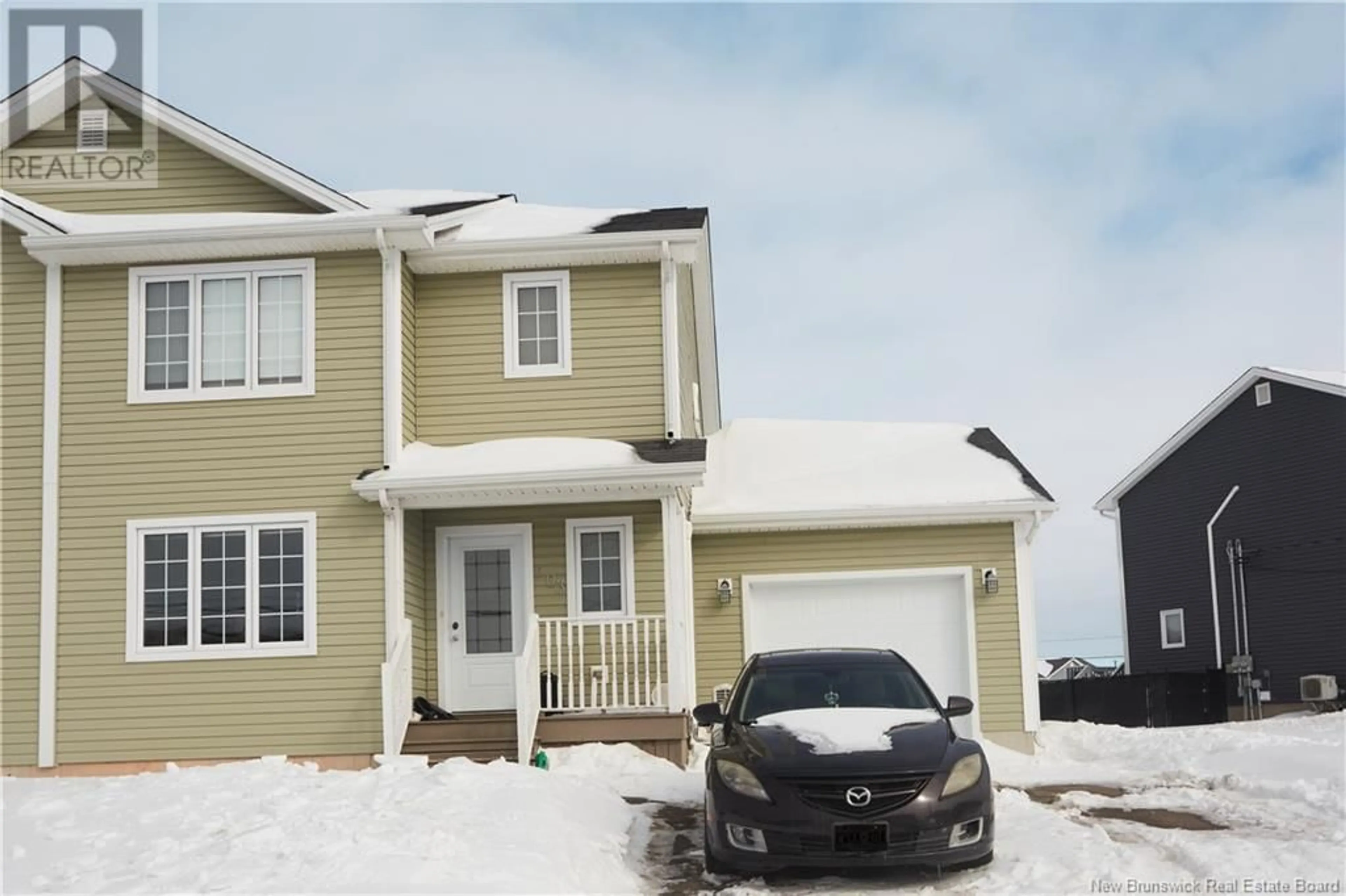 Home with vinyl exterior material, street for 203 SURETTE STREET, Dieppe New Brunswick E1A9R3