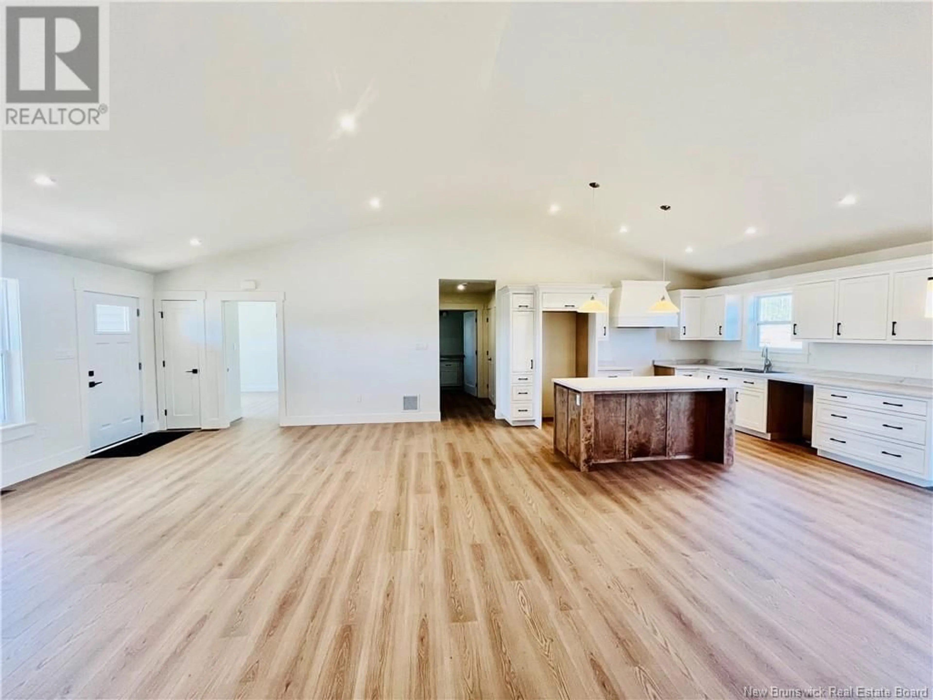 Open concept kitchen, wood/laminate floor for 116 GLENNORTH STREET, Fredericton New Brunswick E3G0A3