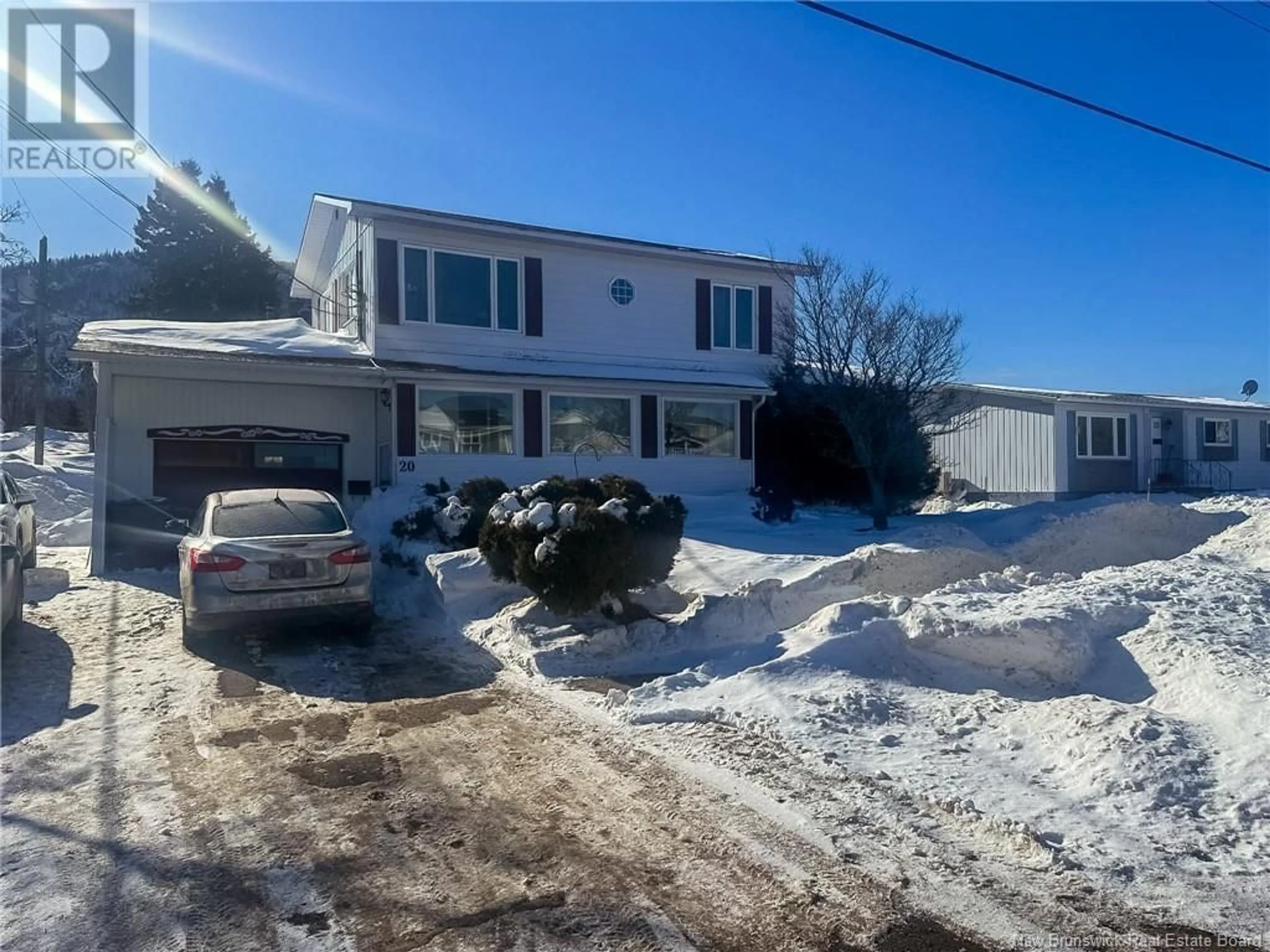 A pic from outside/outdoor area/front of a property/back of a property/a pic from drone, street for 20 Malcolm Avenue, Campbellton New Brunswick E3N3X1